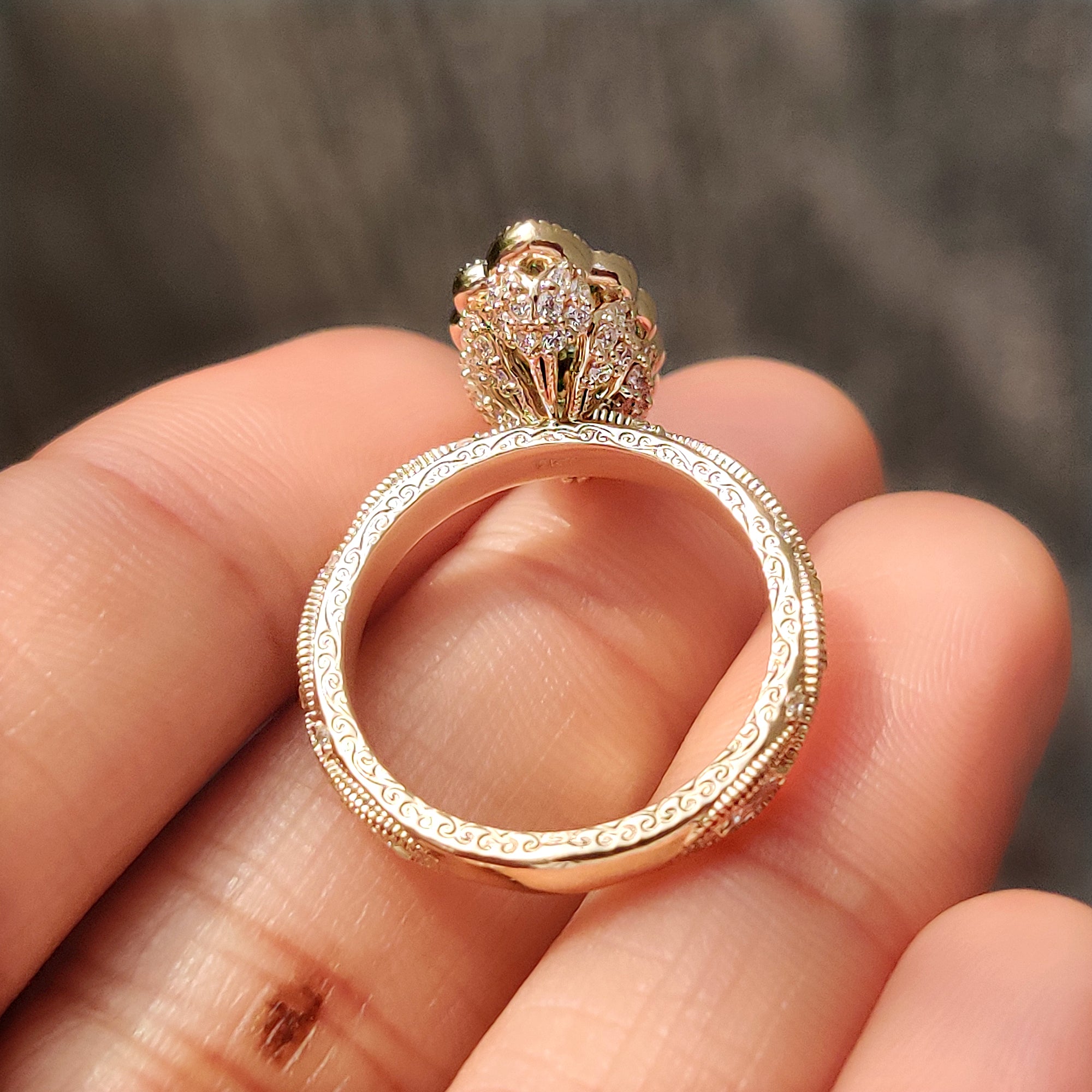 Basket setting green marquise diamond engagement ring.
