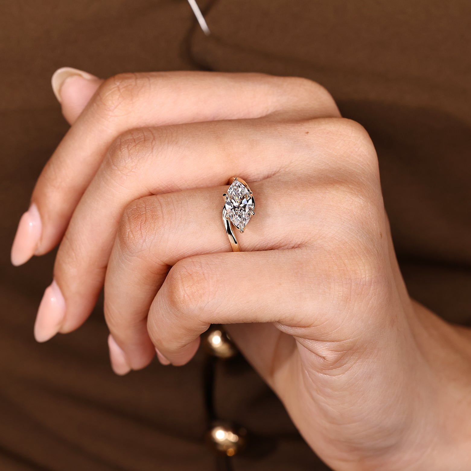 East west marquise diamond ring with solitaire setting
