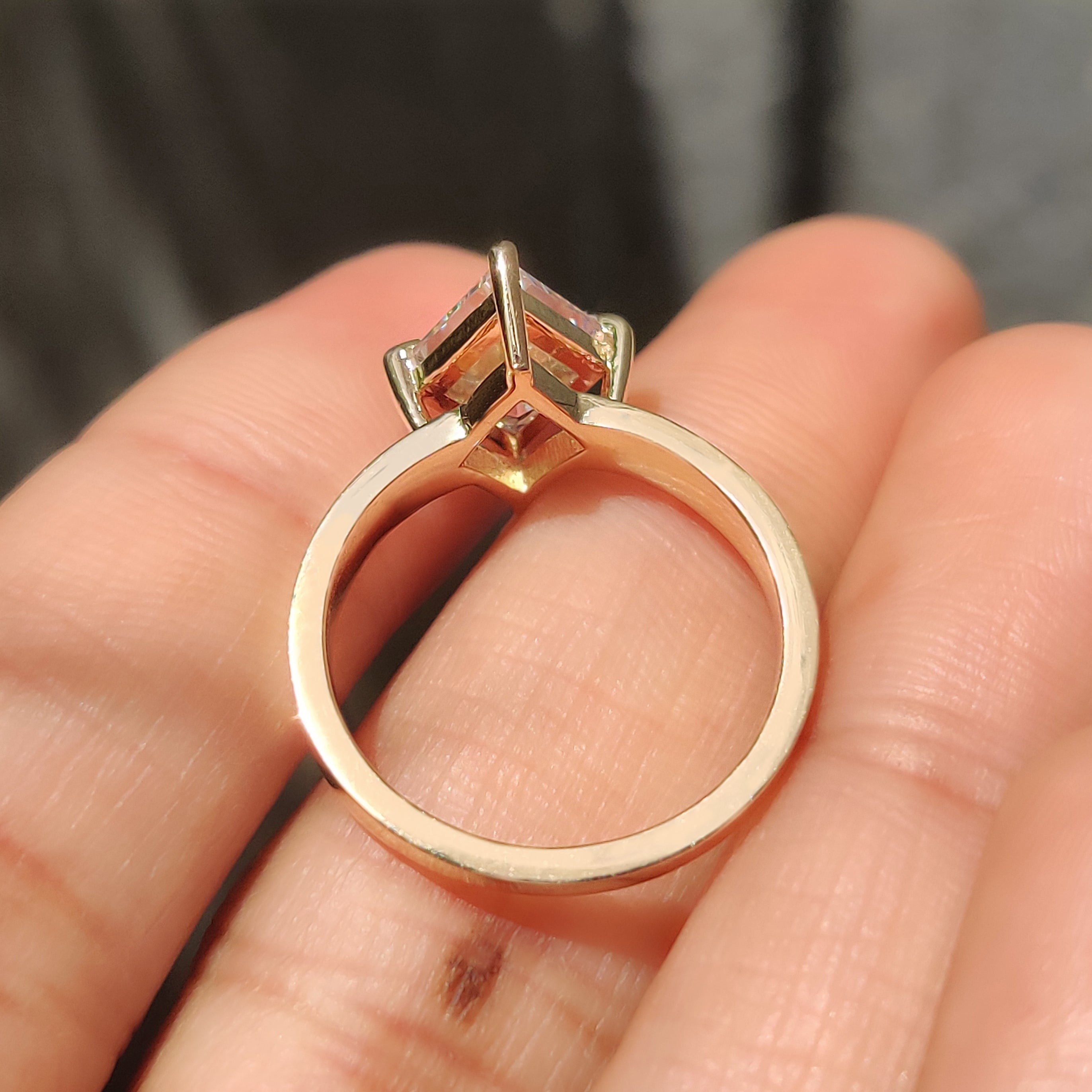 Lozenge cut diamond ring with smooth tapered shank design
