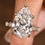 Pear shaped diamond ring with 10 carat pear cut center diamond
