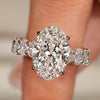 Oval engagement ring with oval side stones
