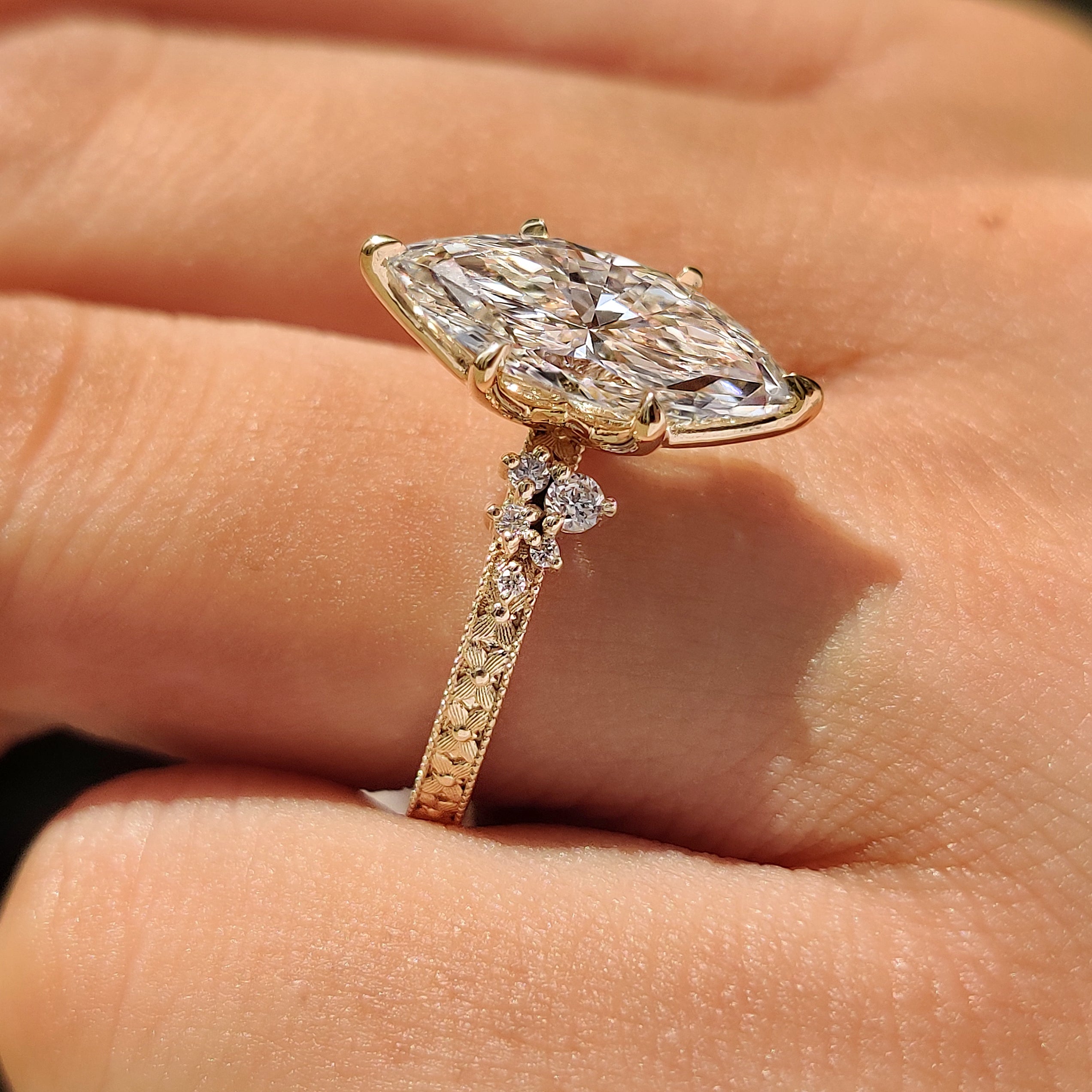 Vintage inspired marquise diamond ring with filigree
