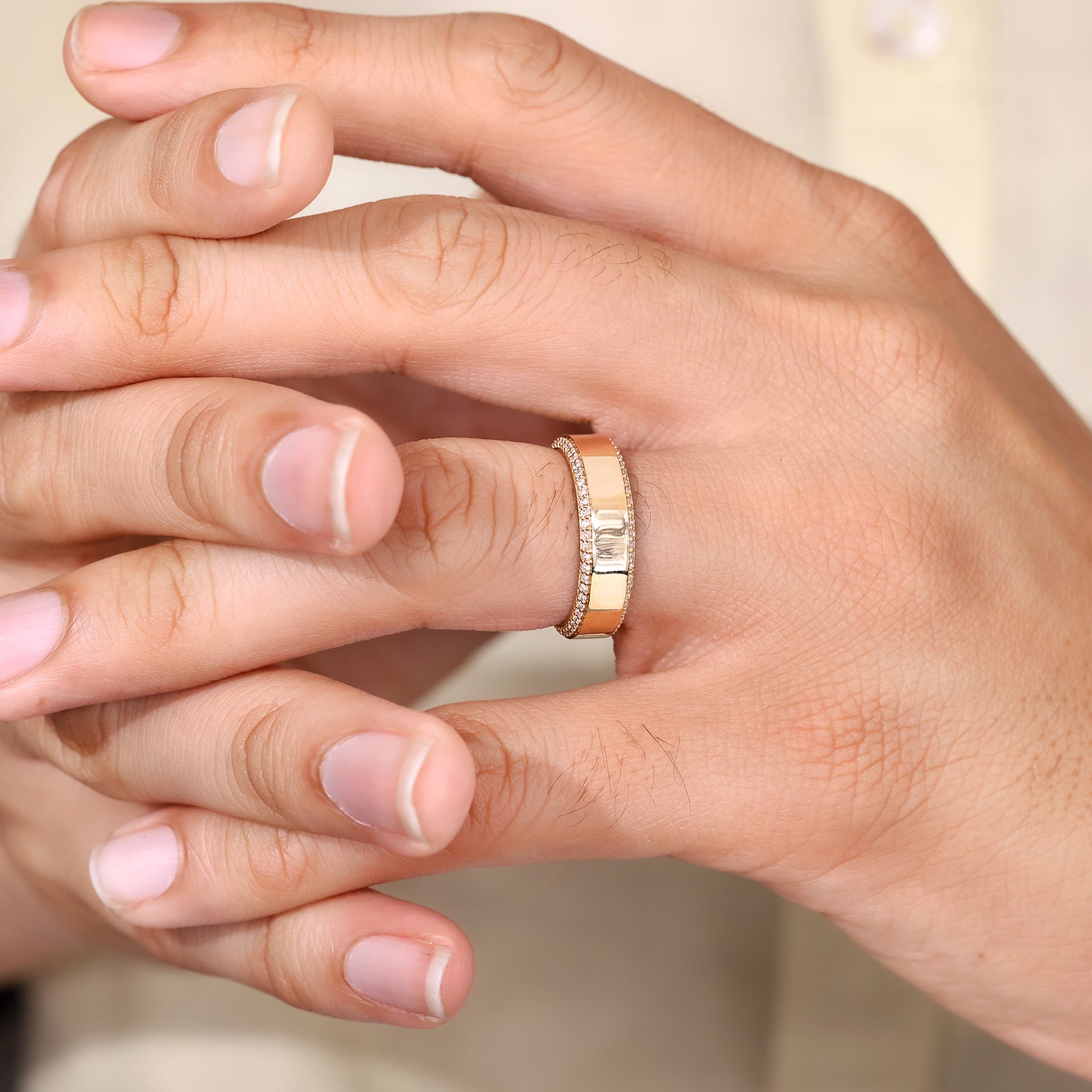Men’s wedding ring with full side diamond details.
