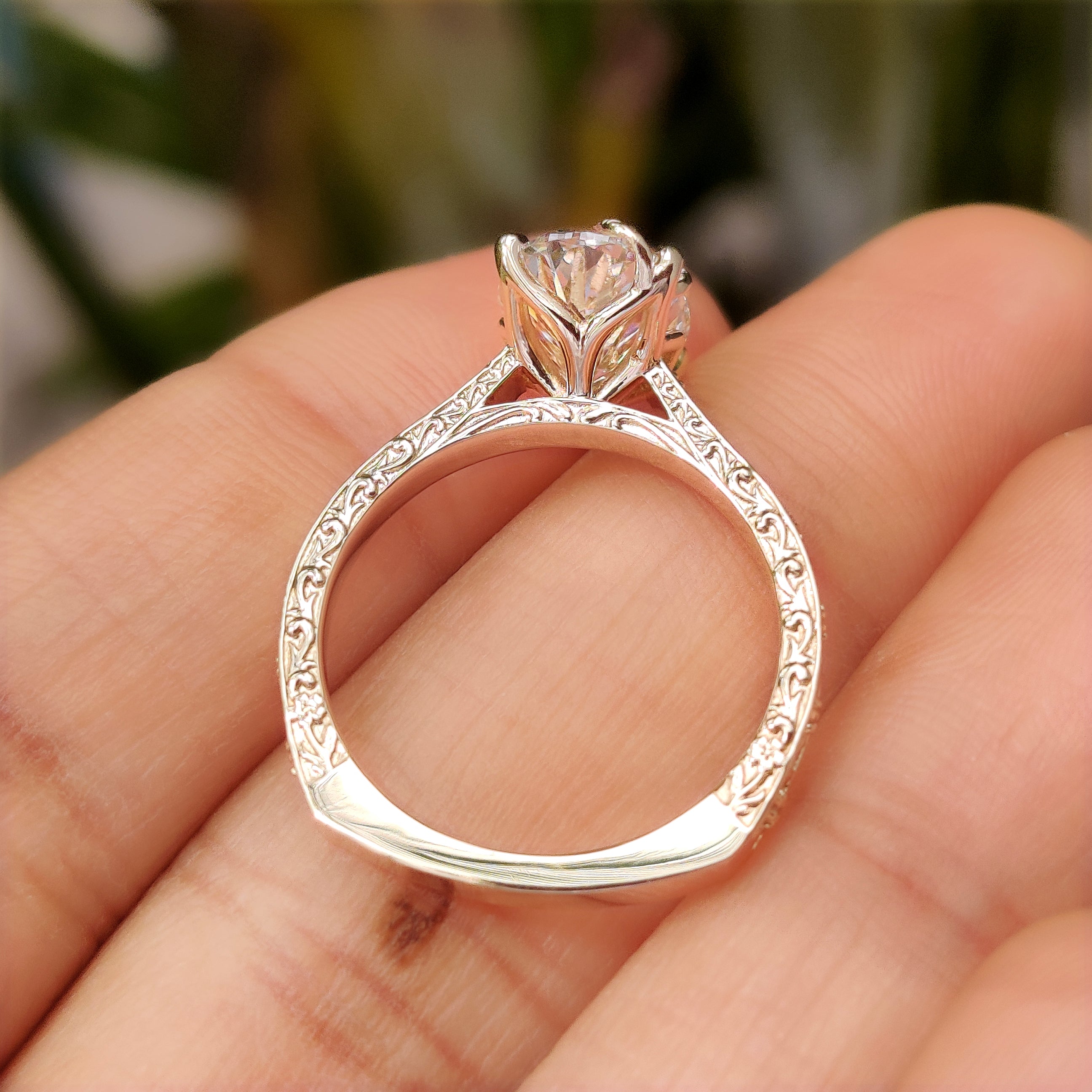 Cathedral oval diamond ring with euro shank band design
