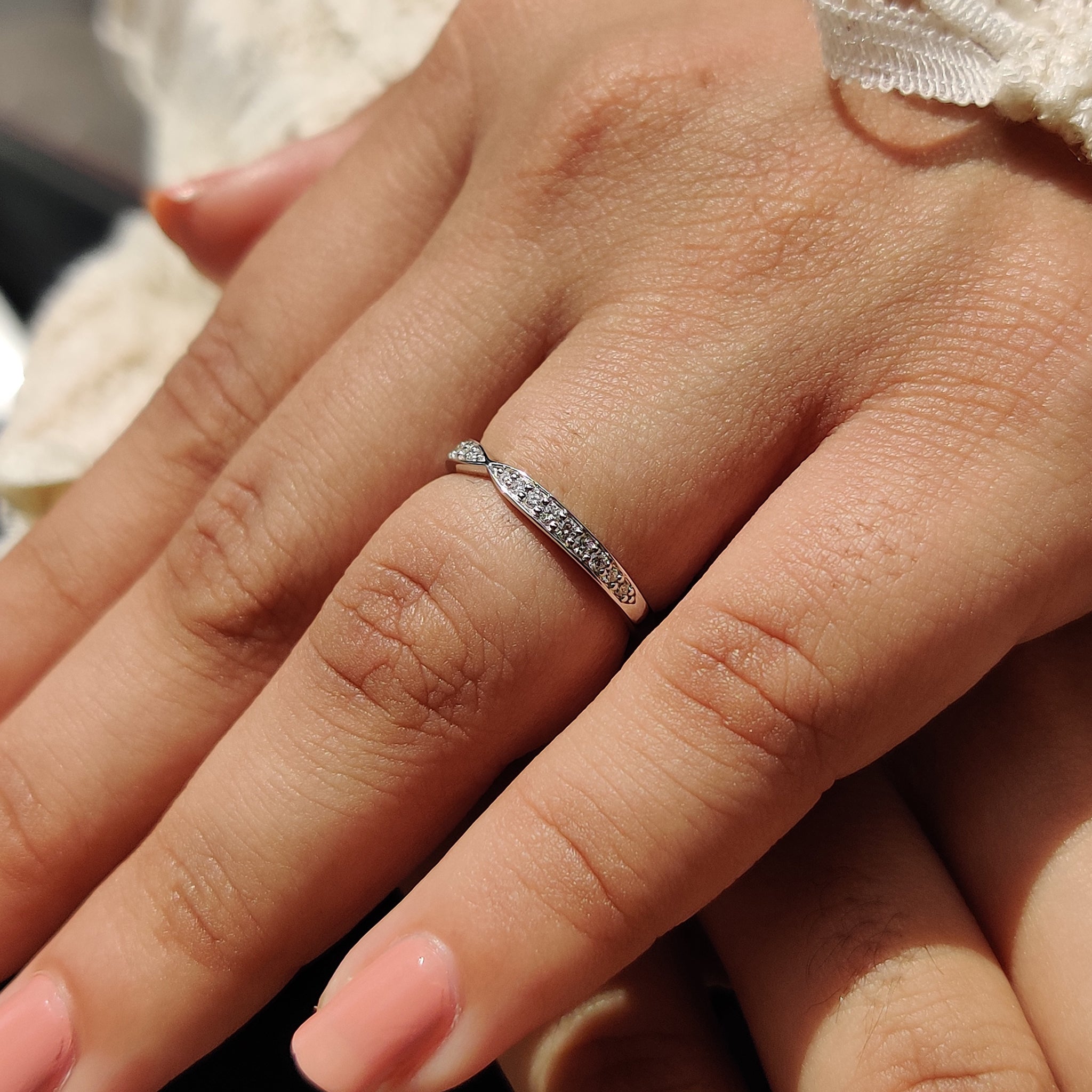 Pave diamond wedding band with a sleek modern design.
