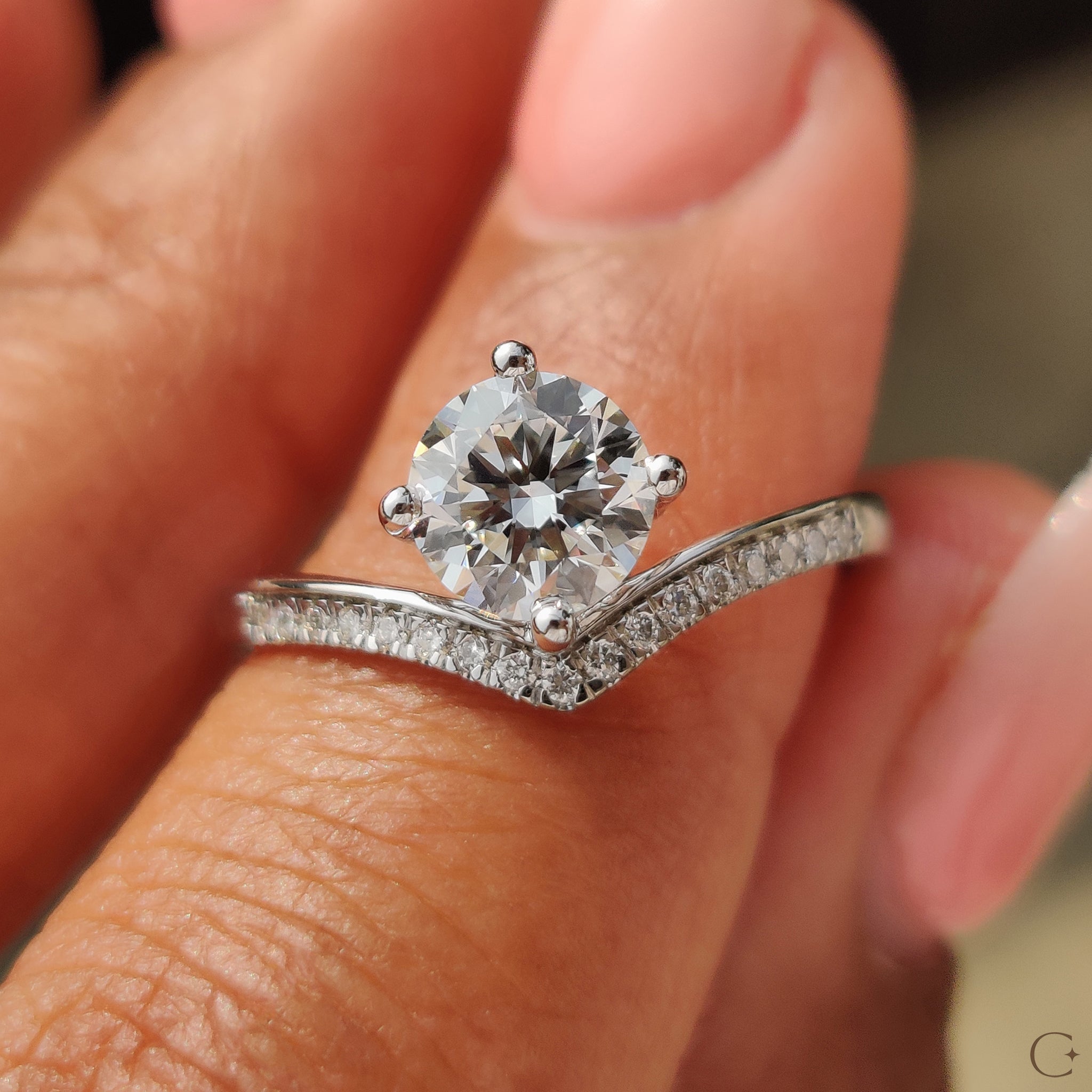 Round diamond ring with a brilliant cut diamond.
