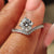 Round diamond ring with a brilliant cut diamond.
