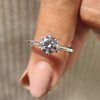 Elegant round solitaire engagement ring featuring a classic design for timeless beauty and sophistication.

