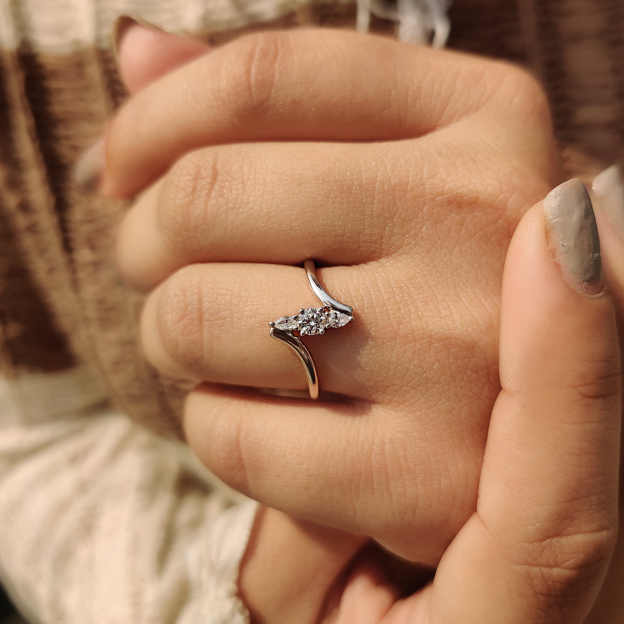 Bypass engagement ring with a unique design.
