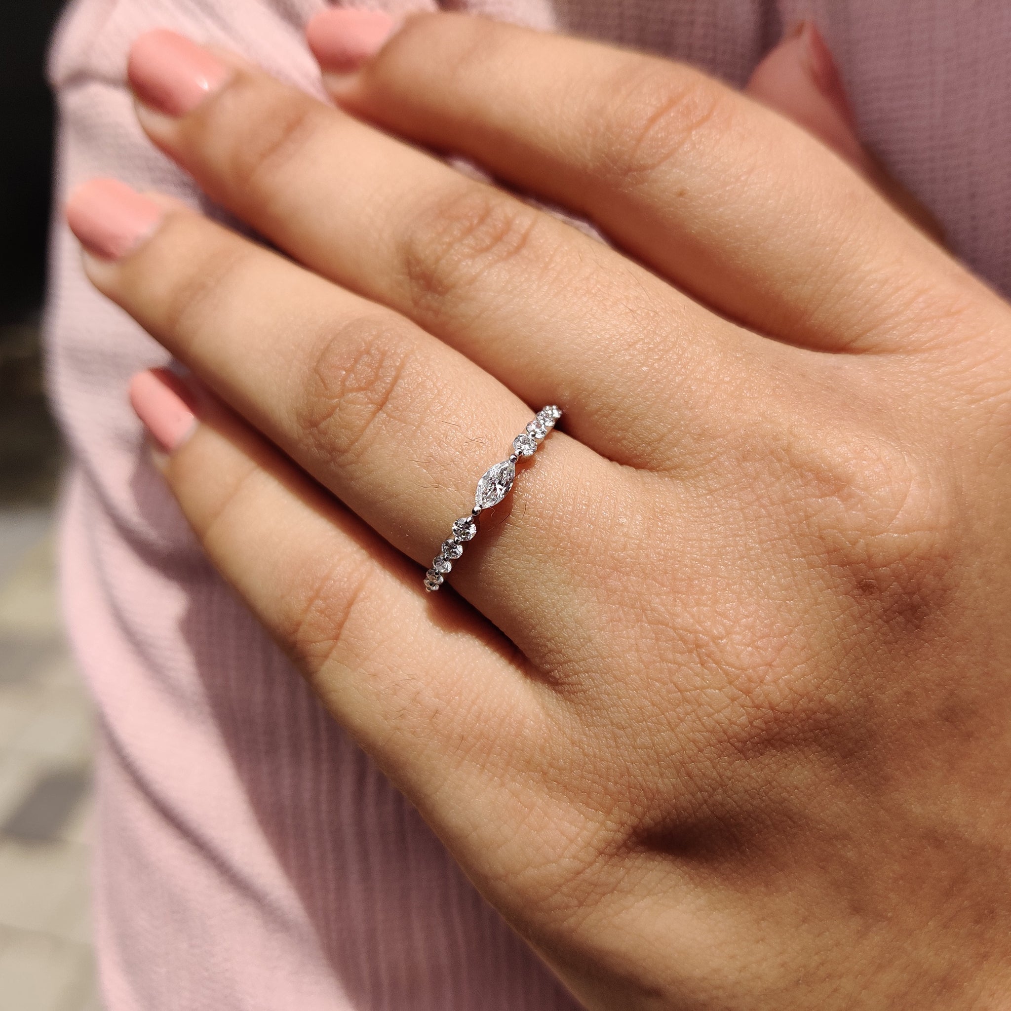 Marquise and round diamond wedding band set on white gold.
