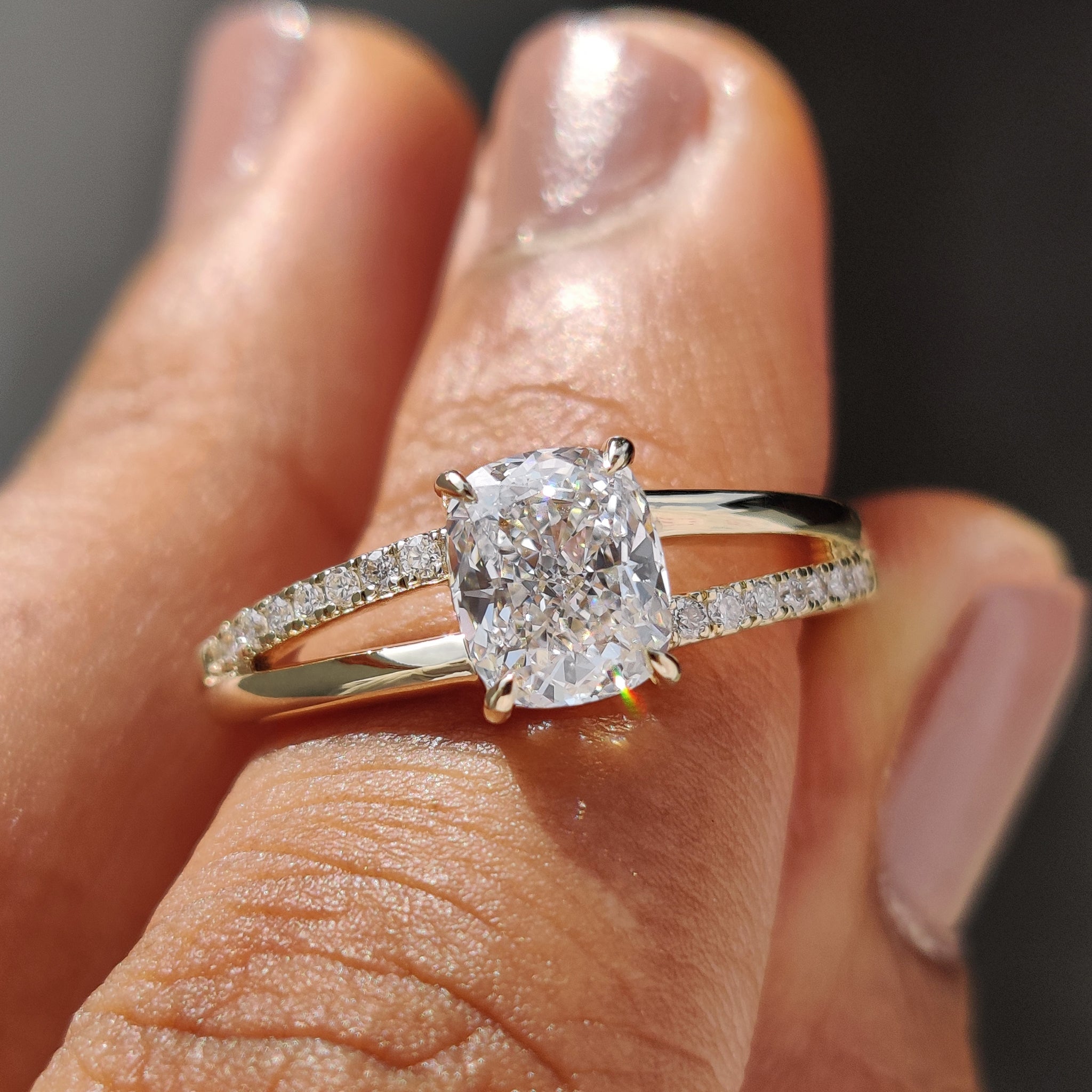 Cushion cut diamond engagement ring with a glowing center.