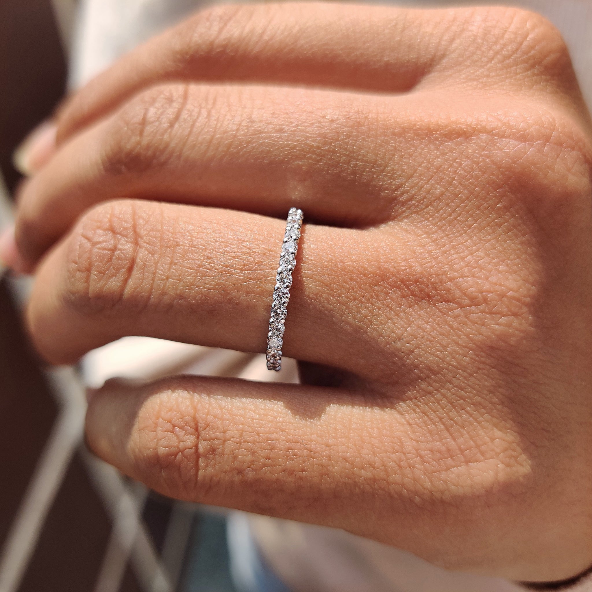Diamond half eternity band with sparkling round cut diamonds.
