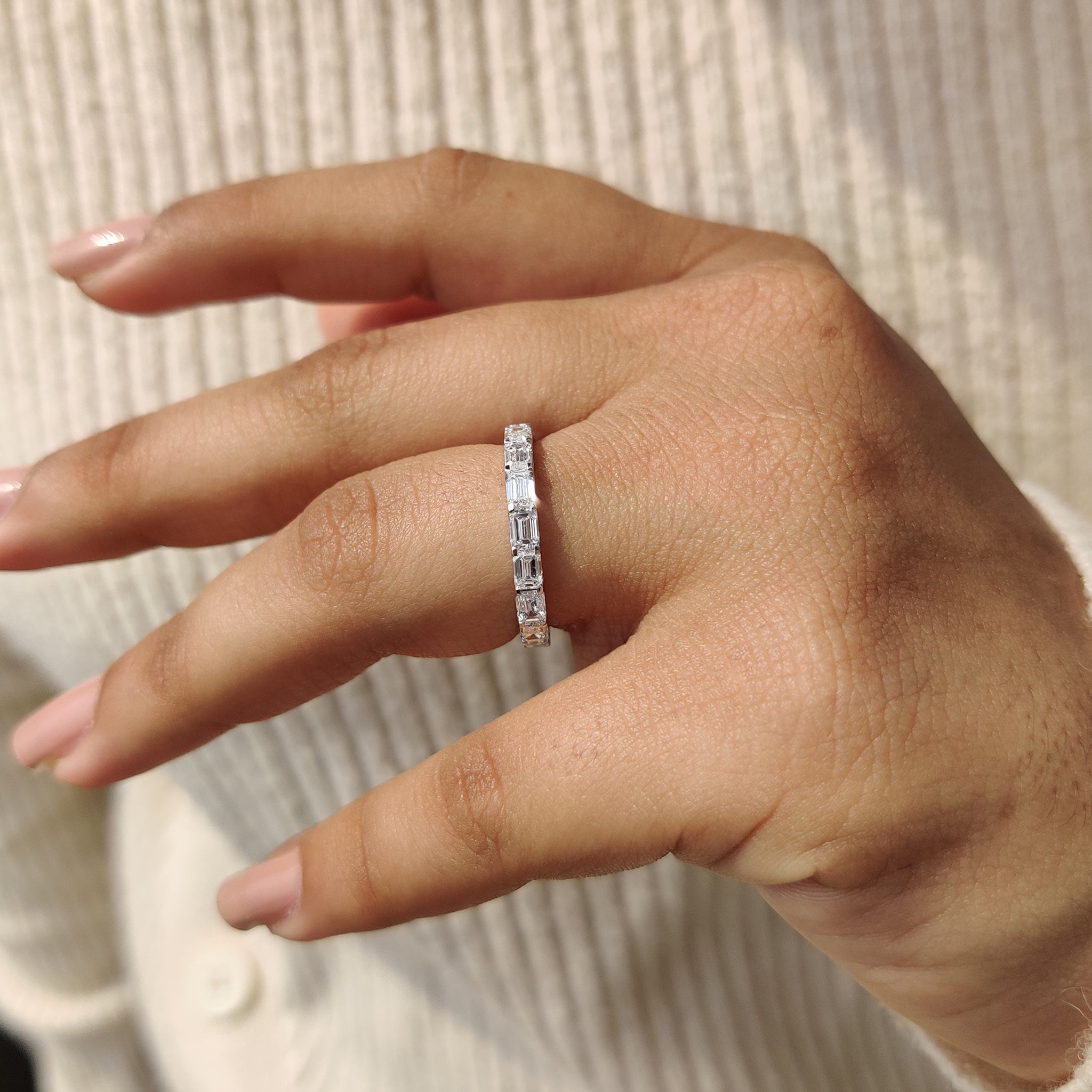 White gold wedding band offering a sleek and modern aesthetic.
