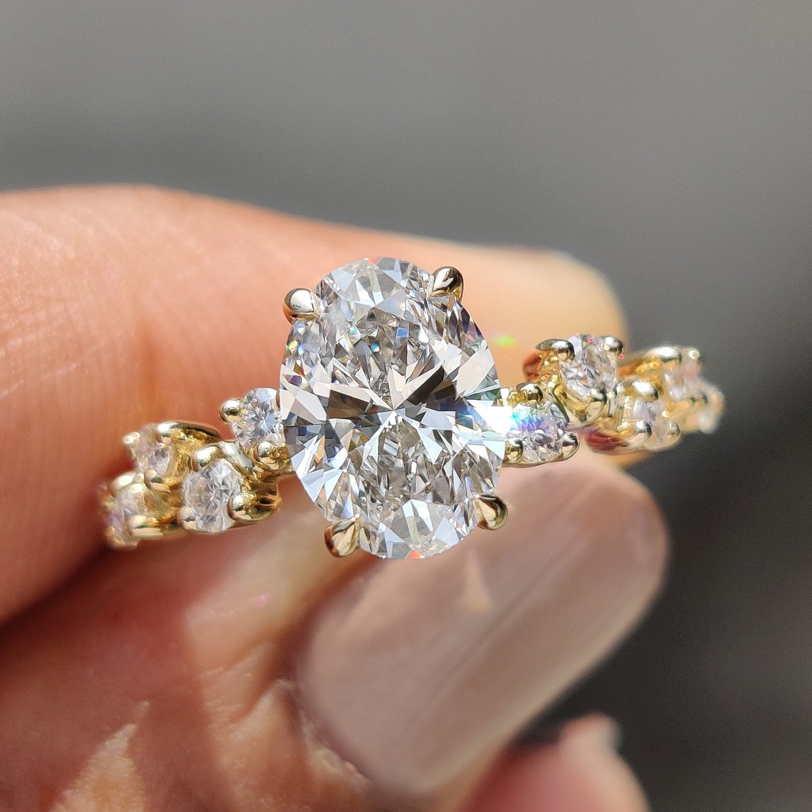 Oval shape engagement ring featuring a stunning lab-grown diamond.

