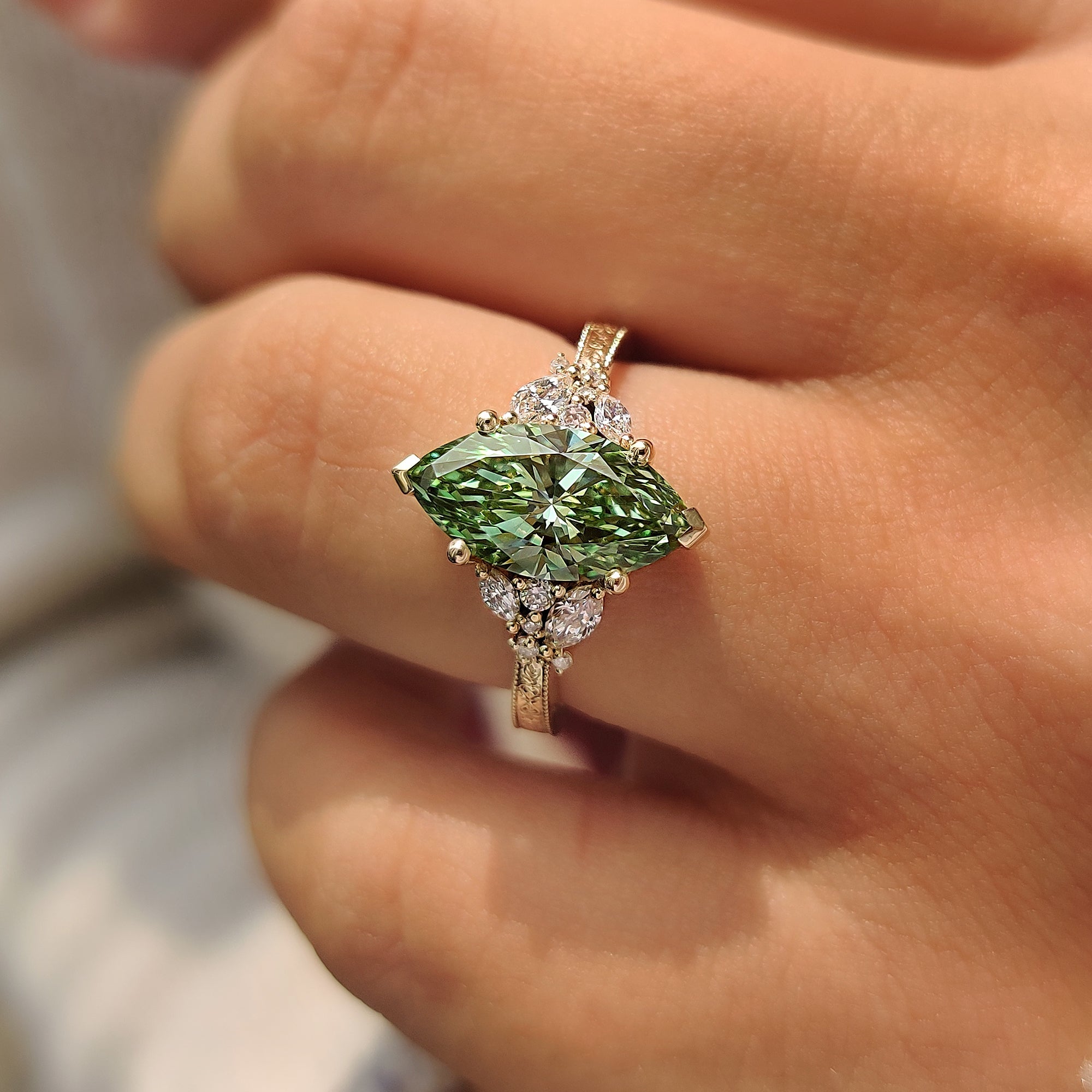 Yellow gold green marquise cluster ring handmade by Carat Diamonds.
