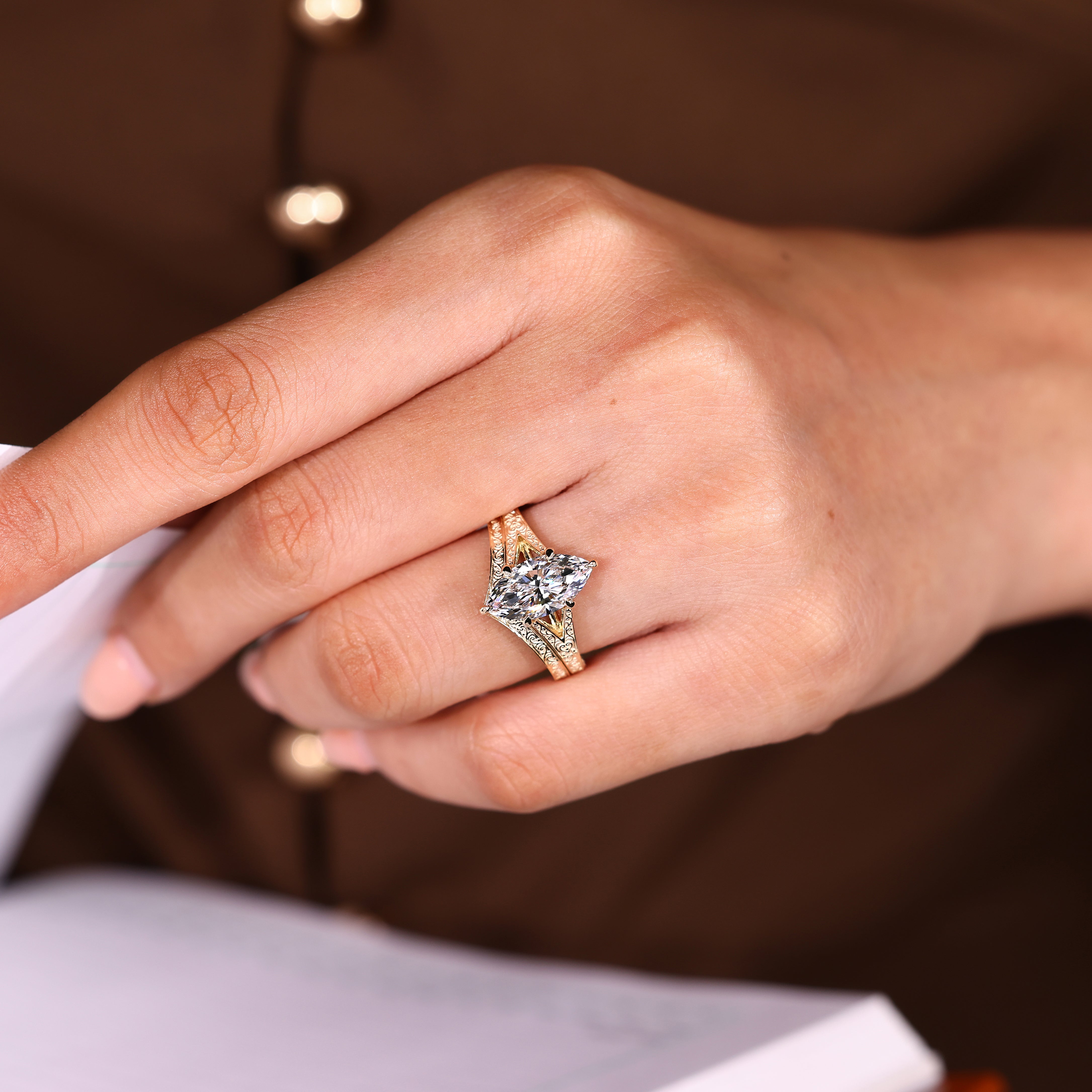 Lab grown marquise engagement ring set with a tulip setting and pavé bands
