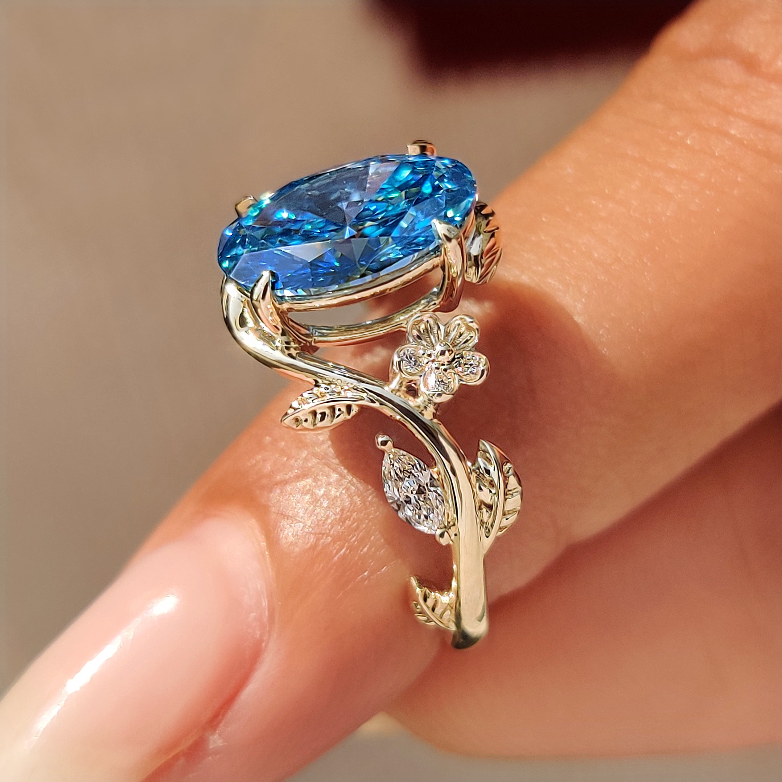 Nature inspired solitaire ring with oak leaf and acorn design.
