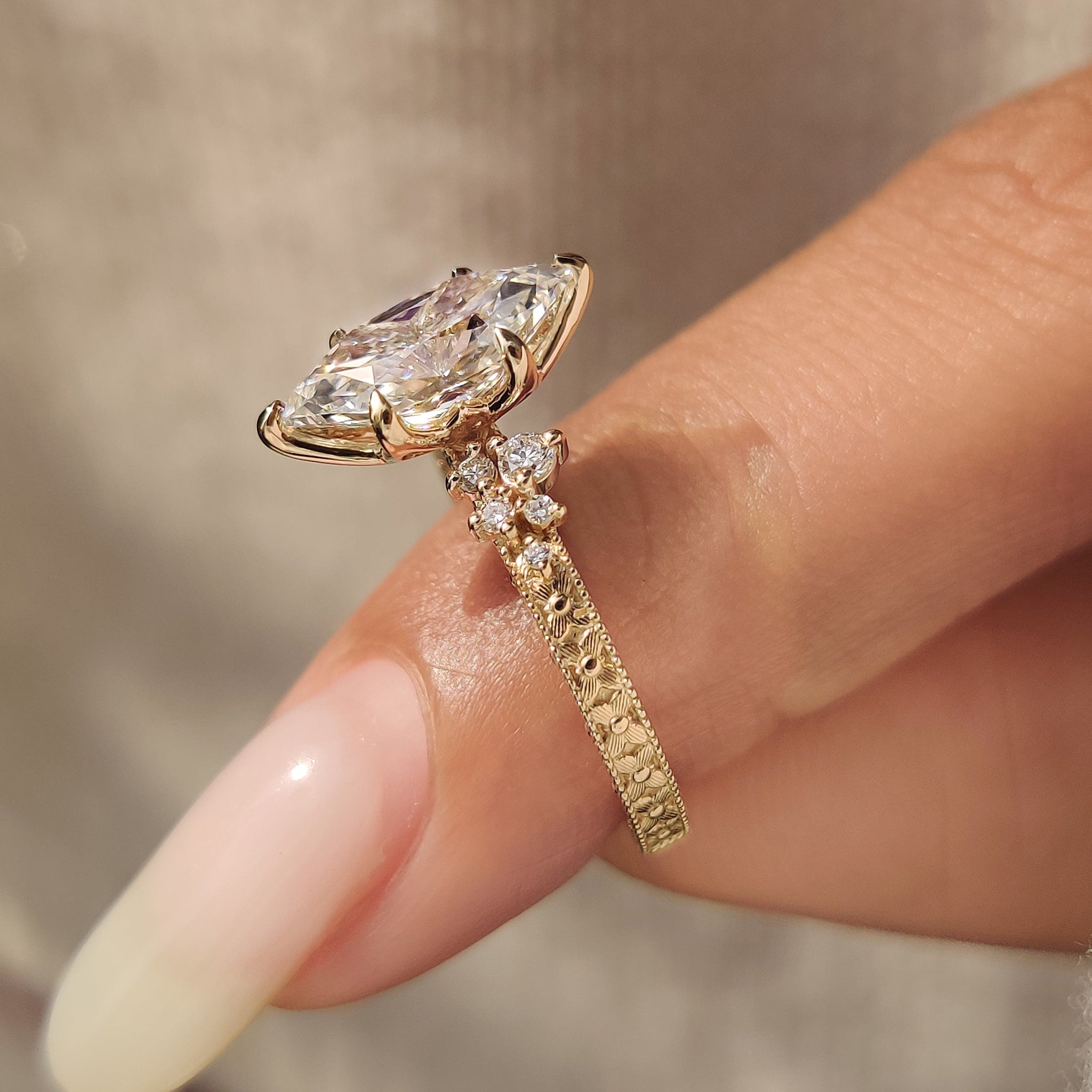 Dutch marquise diamond ring with six claw prong setting.
