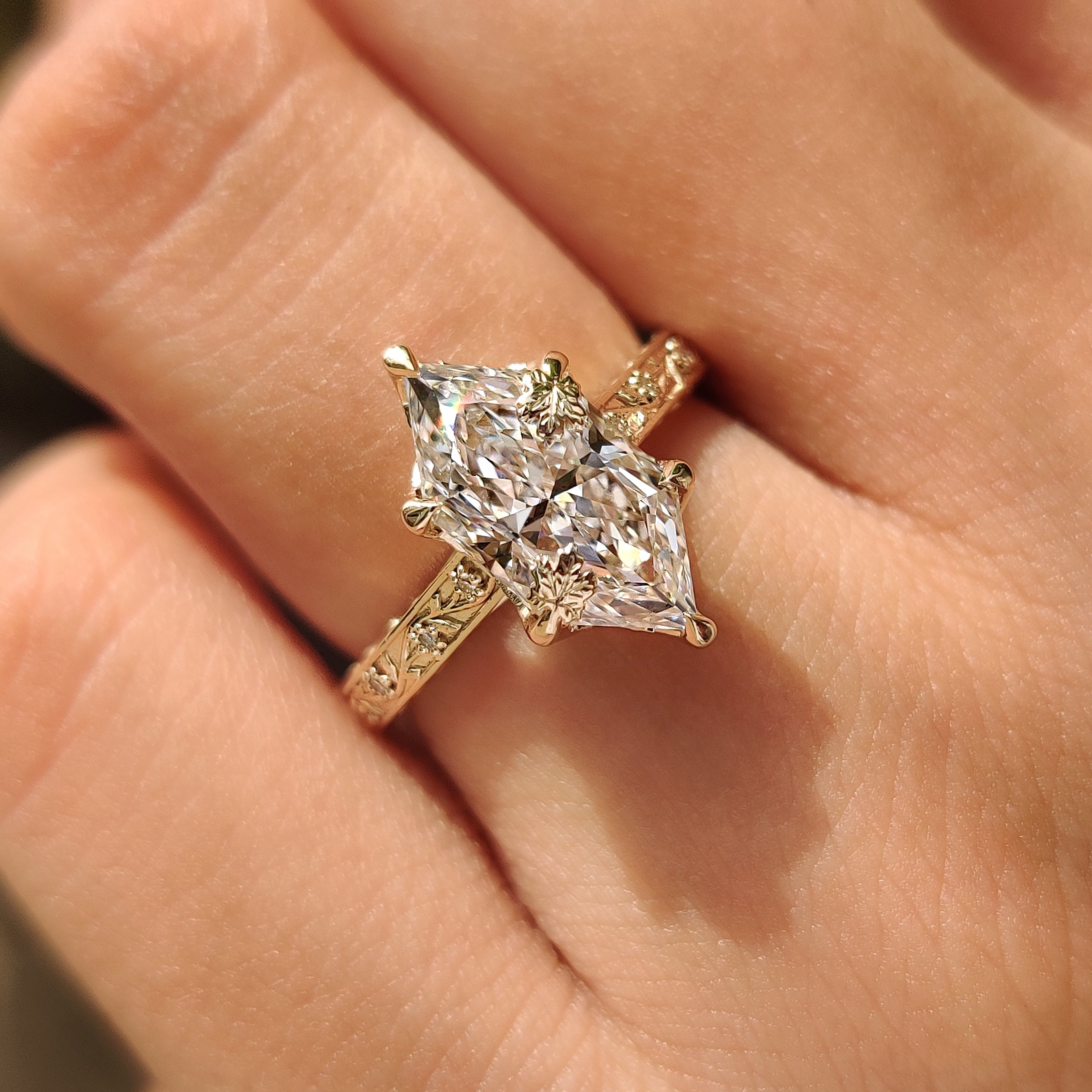 Floral and vine Dutch marquise diamond ring
