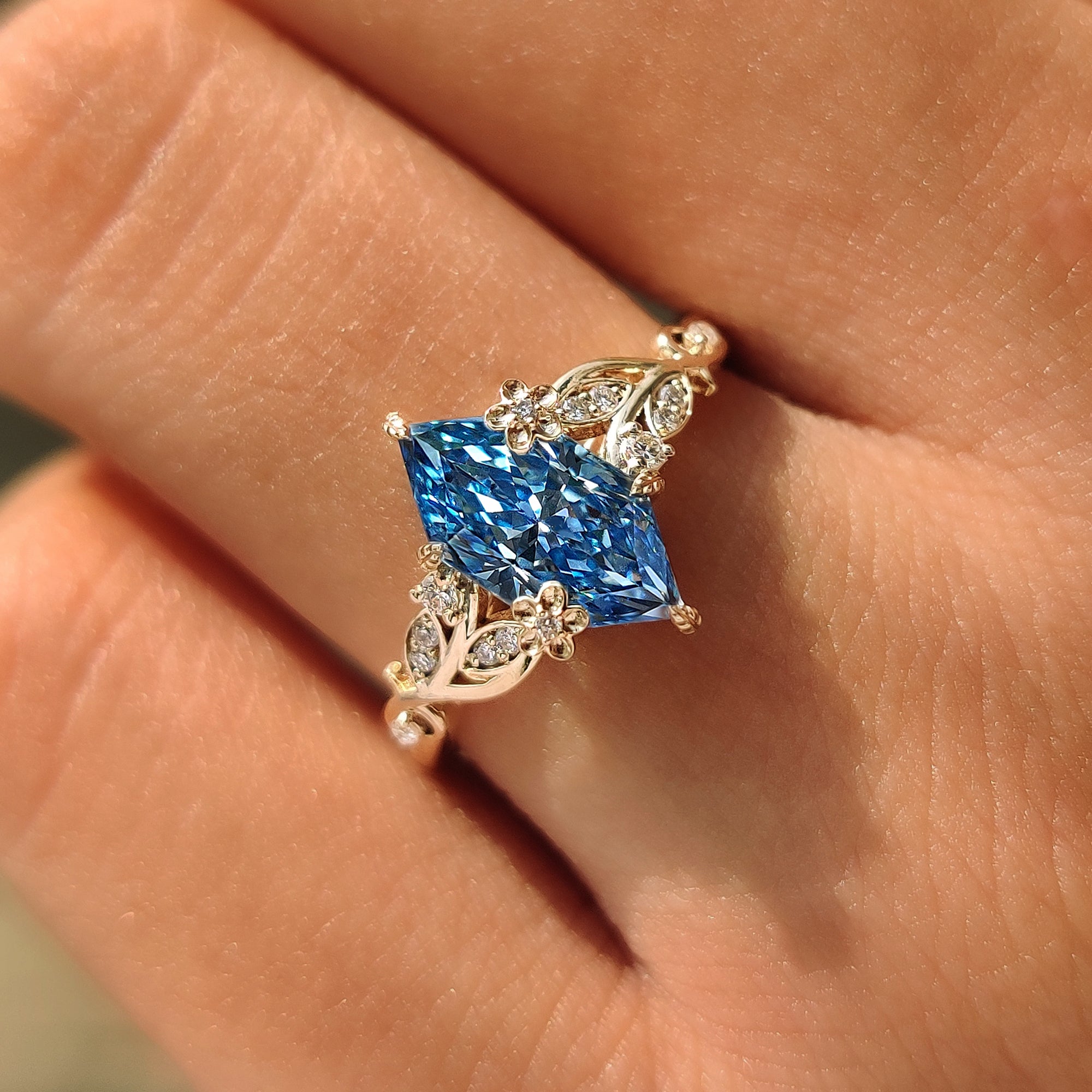 Dutch marquise engagement ring with an open gallery beneath the center stone.
