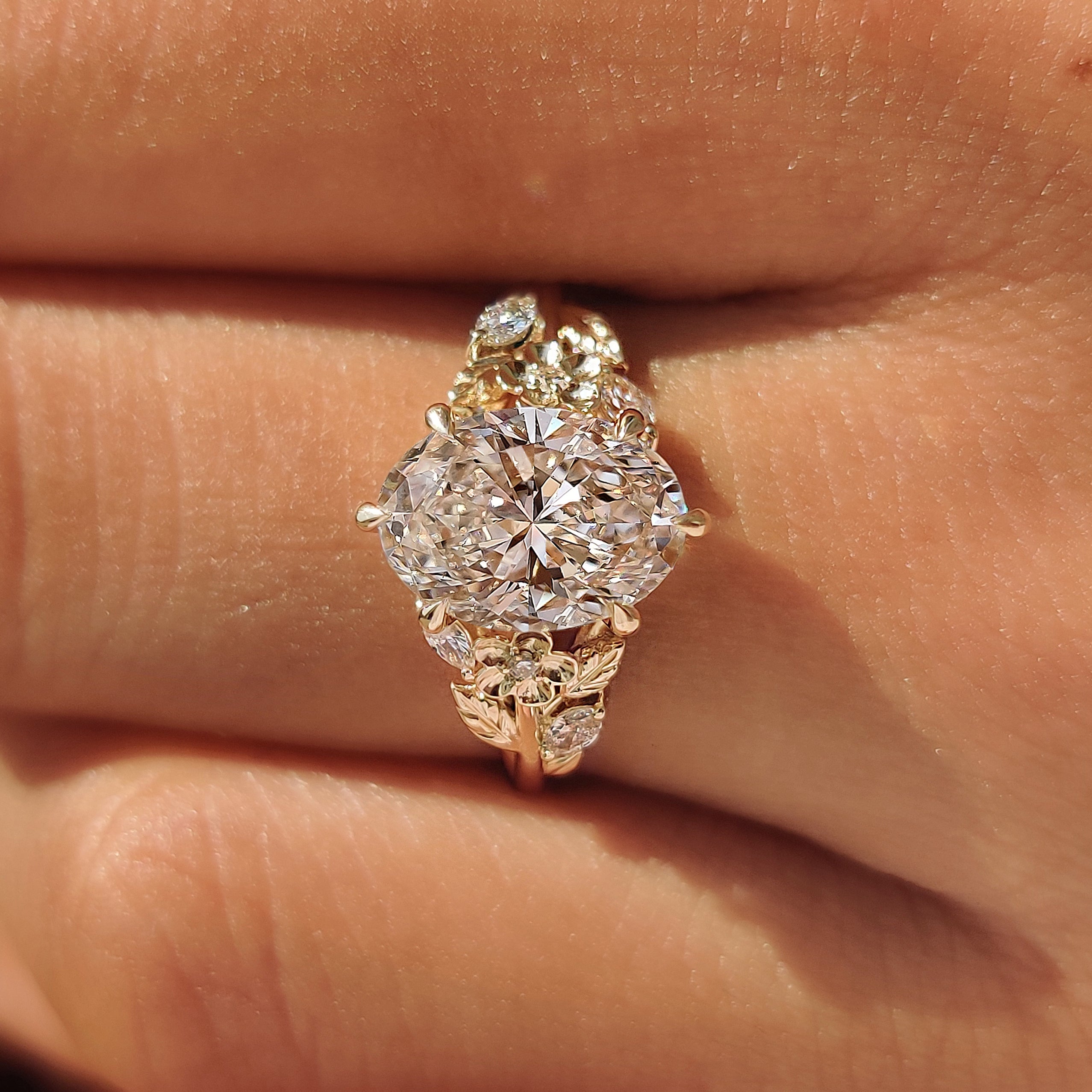Cathedral profile on an oval diamond ring.
