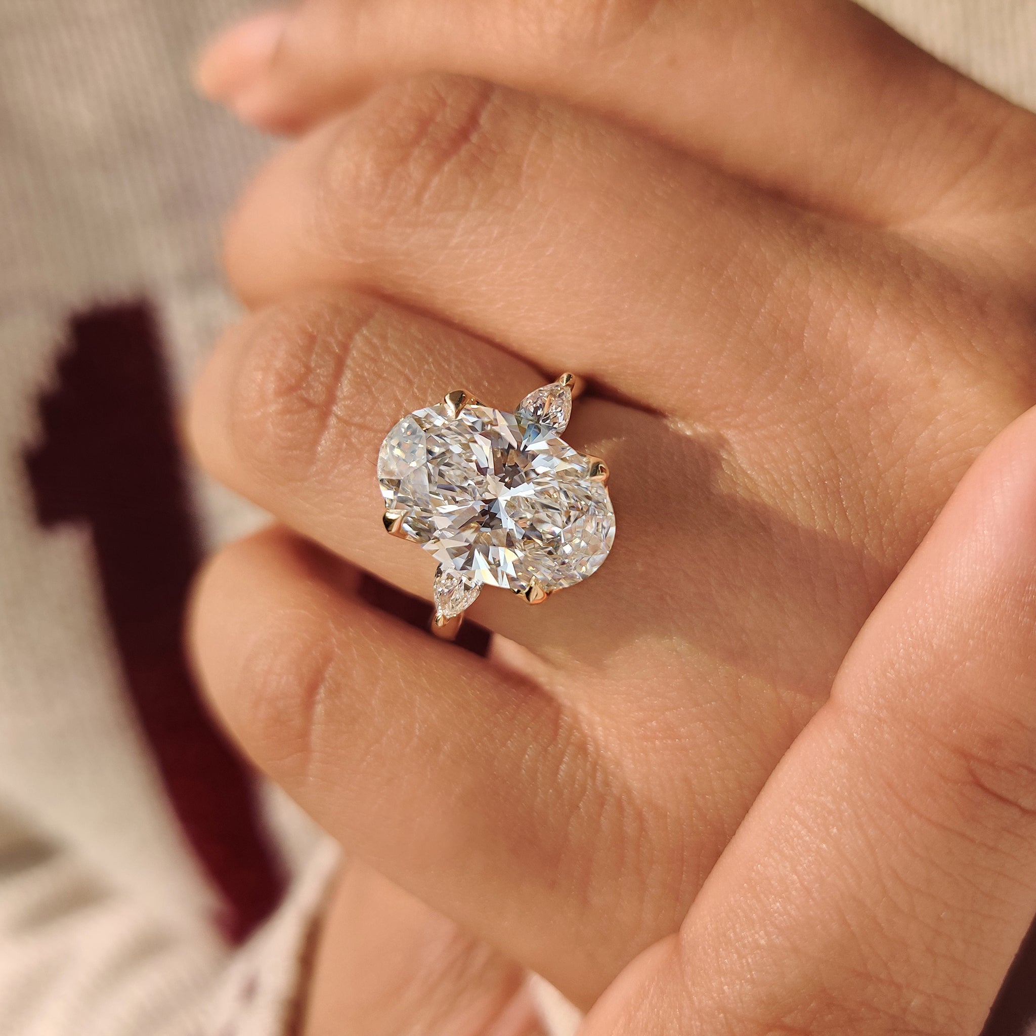 Lab grown oval diamond ring with tulip style setting

