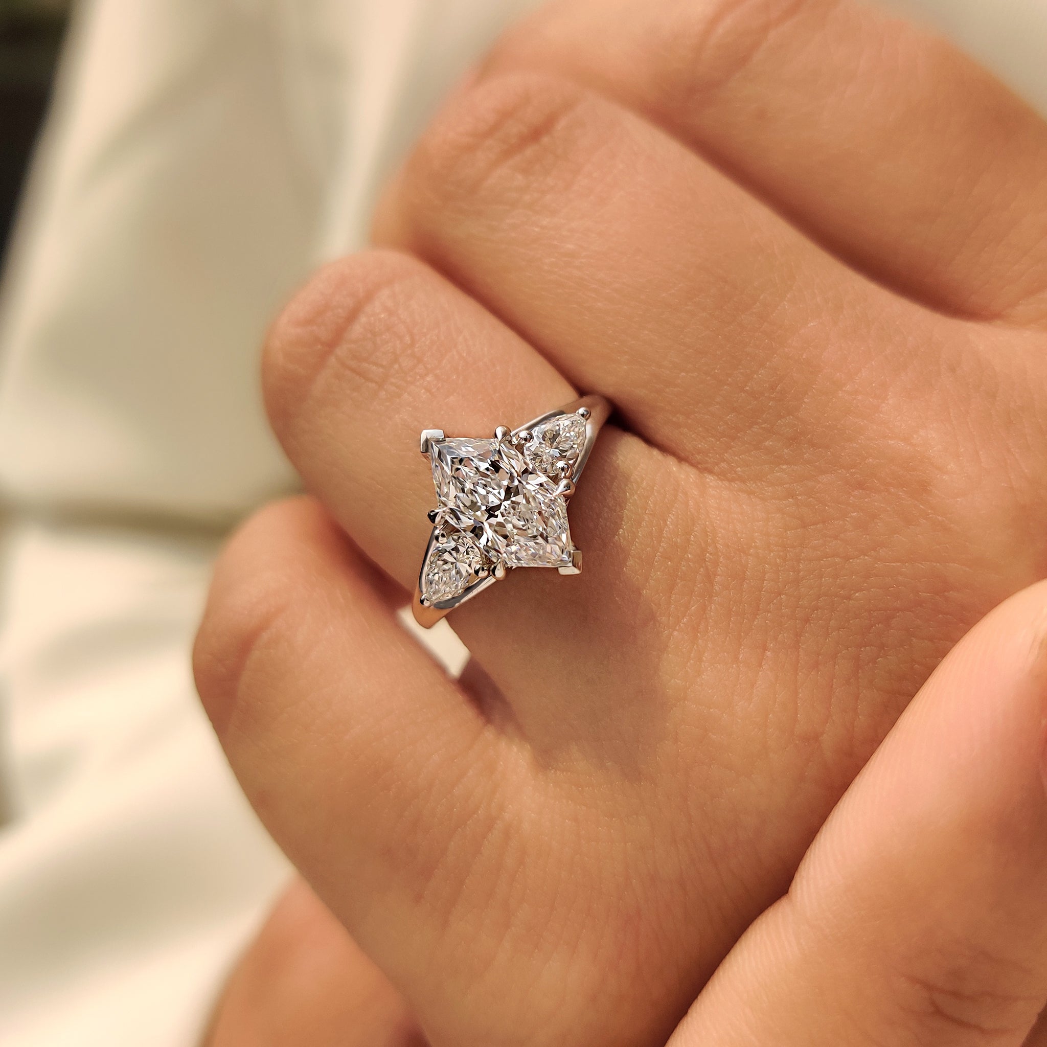 Handmade marquise diamond ring with claw prong setting design.
