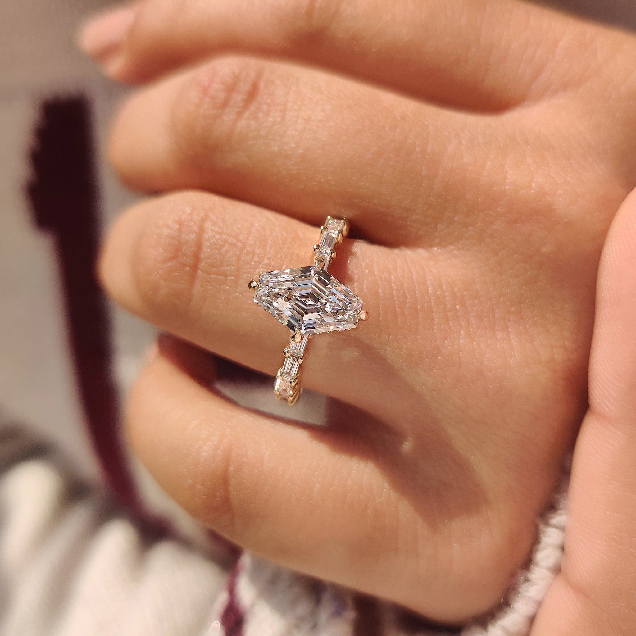 Handmade hexagon ring with baguette pave and hidden halo.
