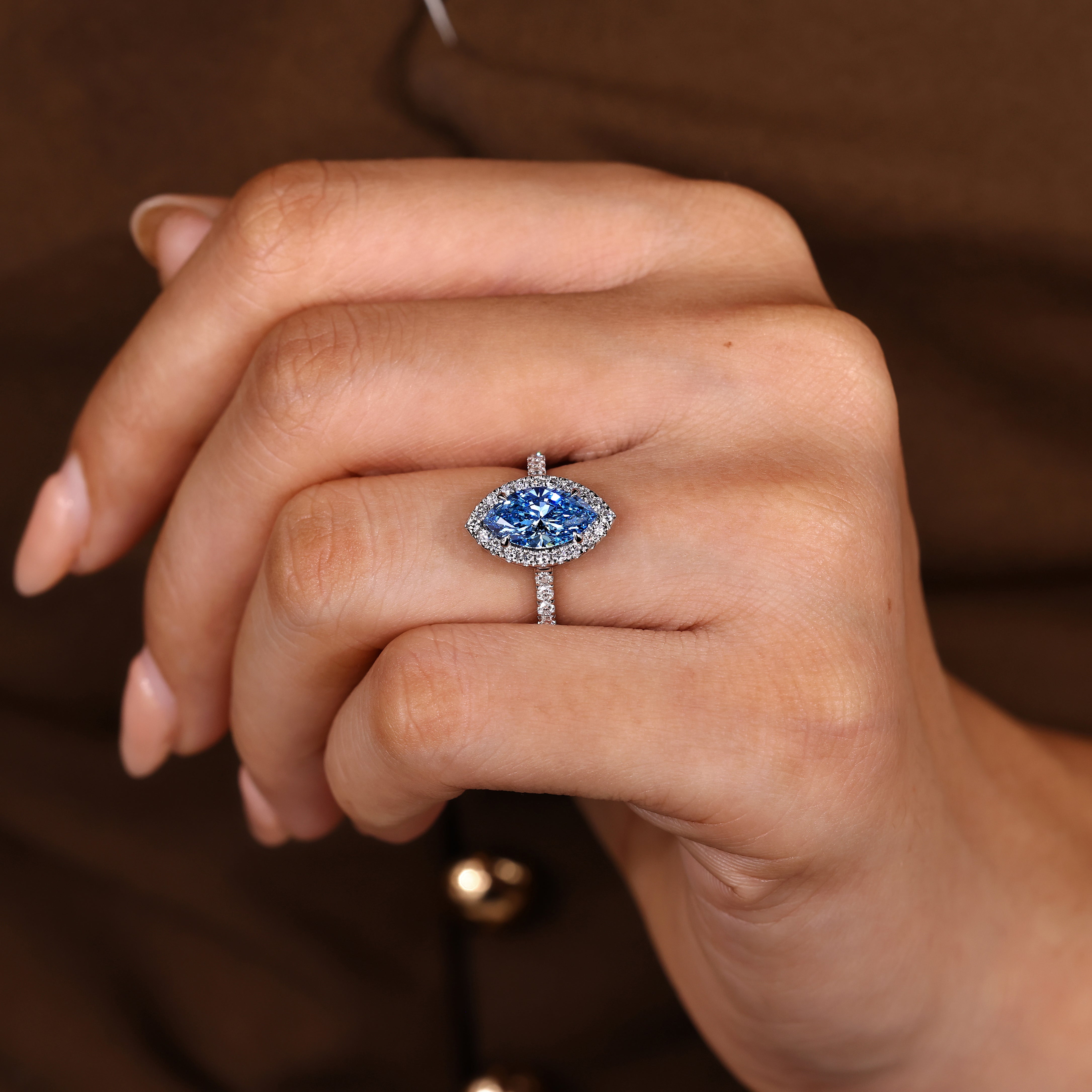 Lab grown marquise diamond ring with pave round diamonds
