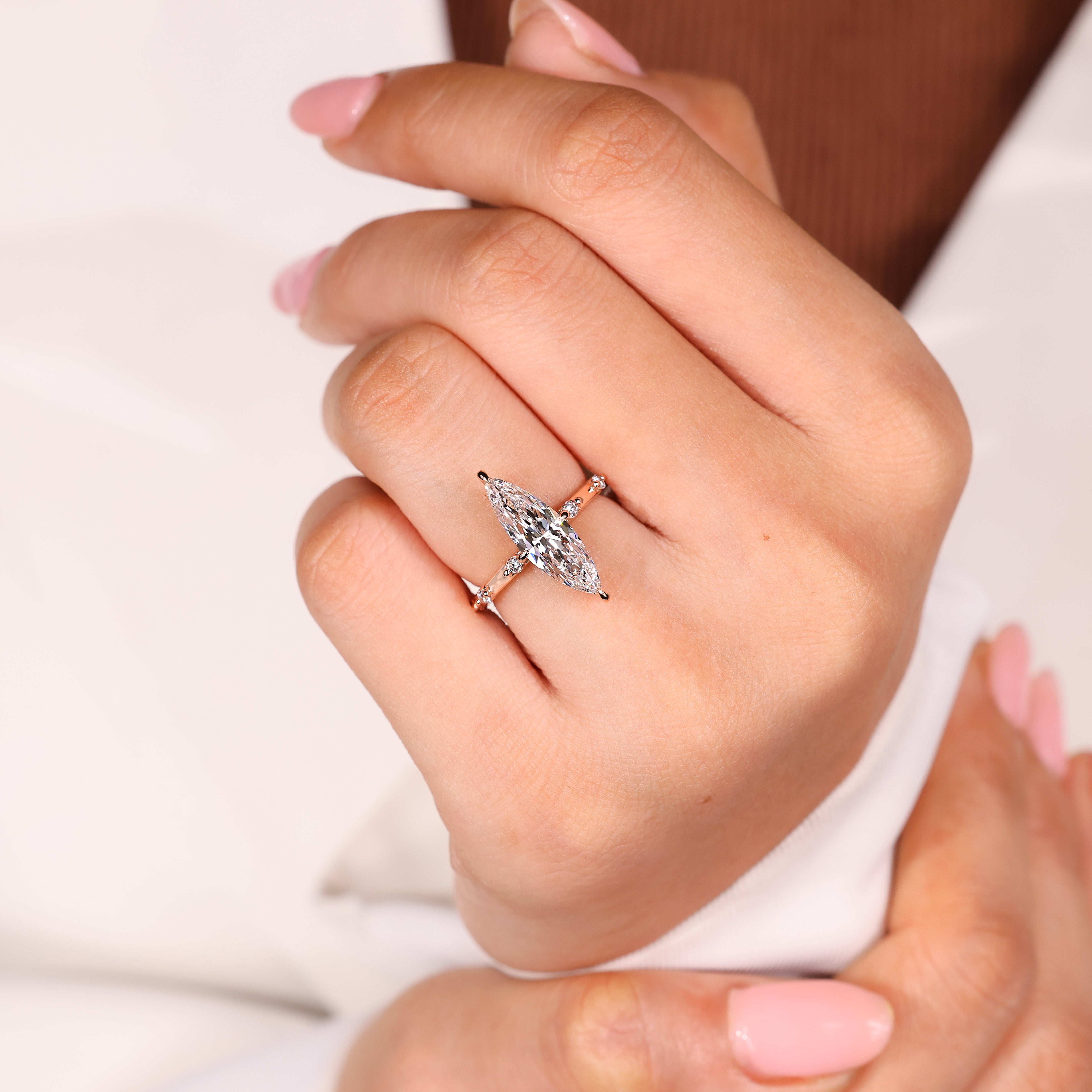 Lab grown marquise ring with compass claw prong setting
