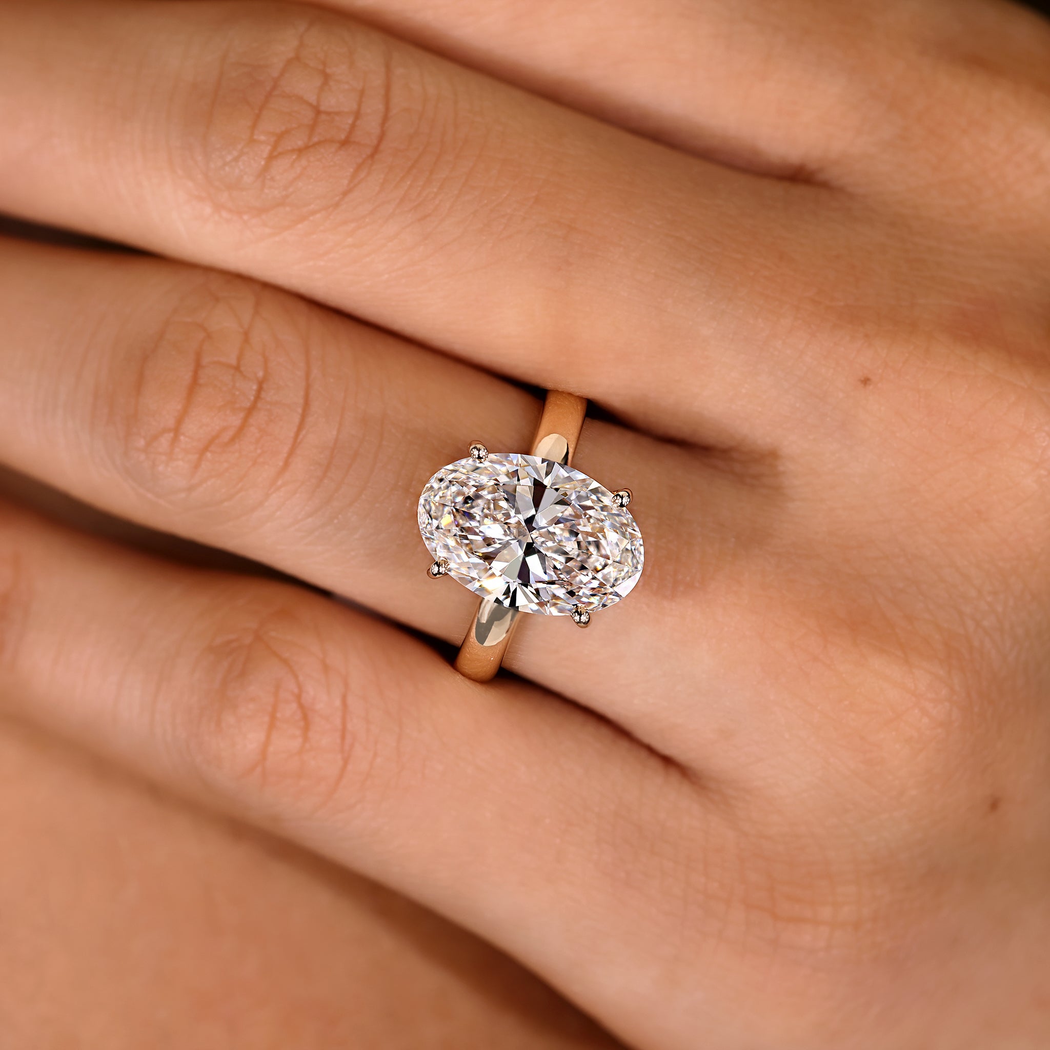 Lab grown hidden halo engagement ring available in 5 carat
