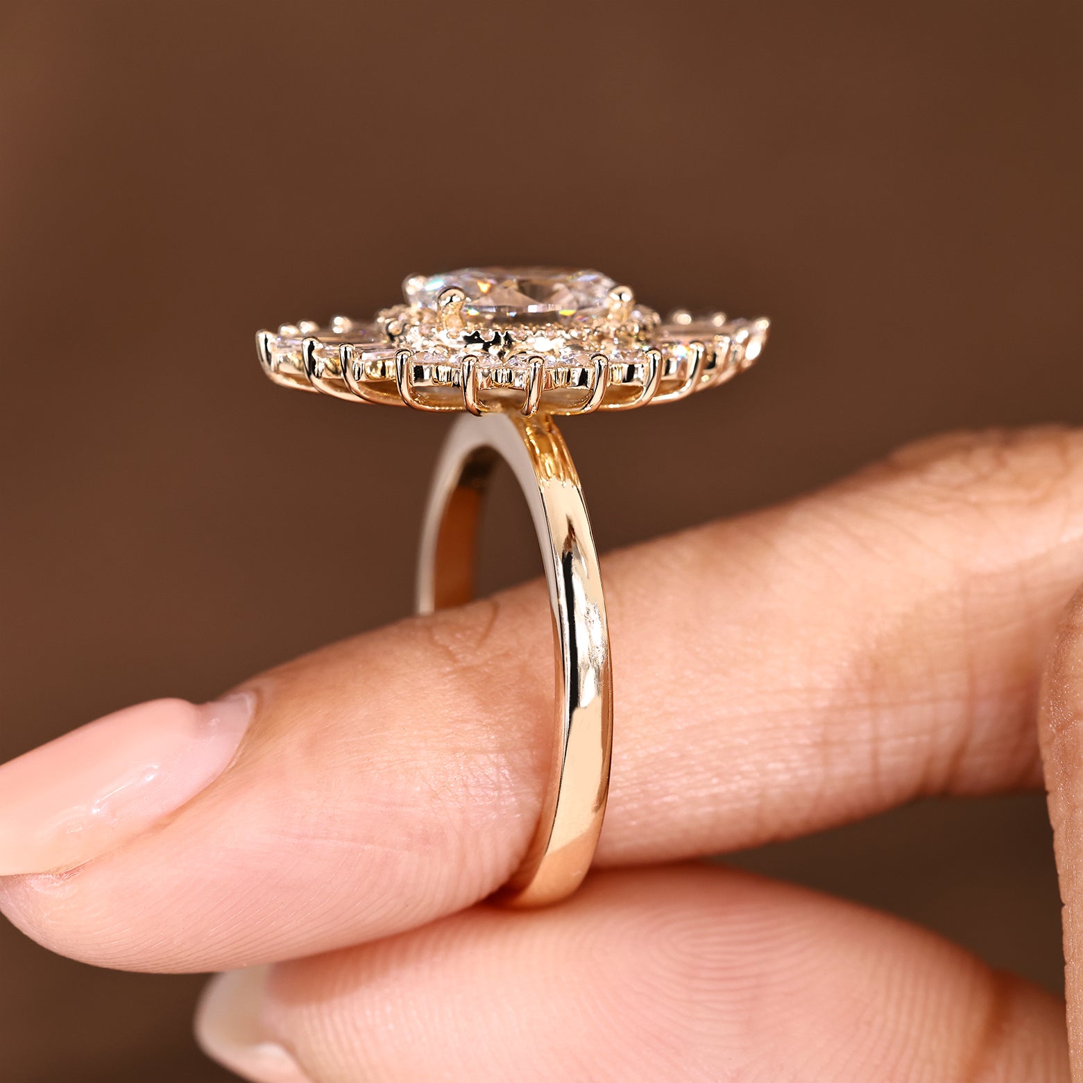 Handmade oval ring with snowflake halo and round diamonds
