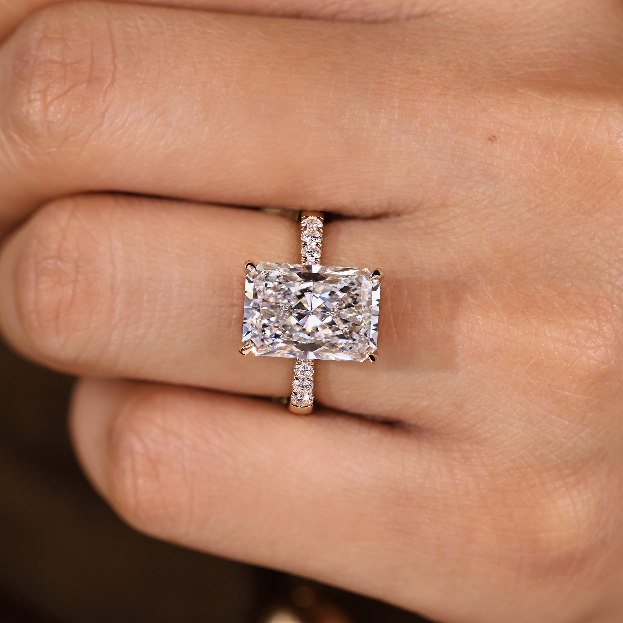 Four claw prong 5 carat radiant diamond ring
