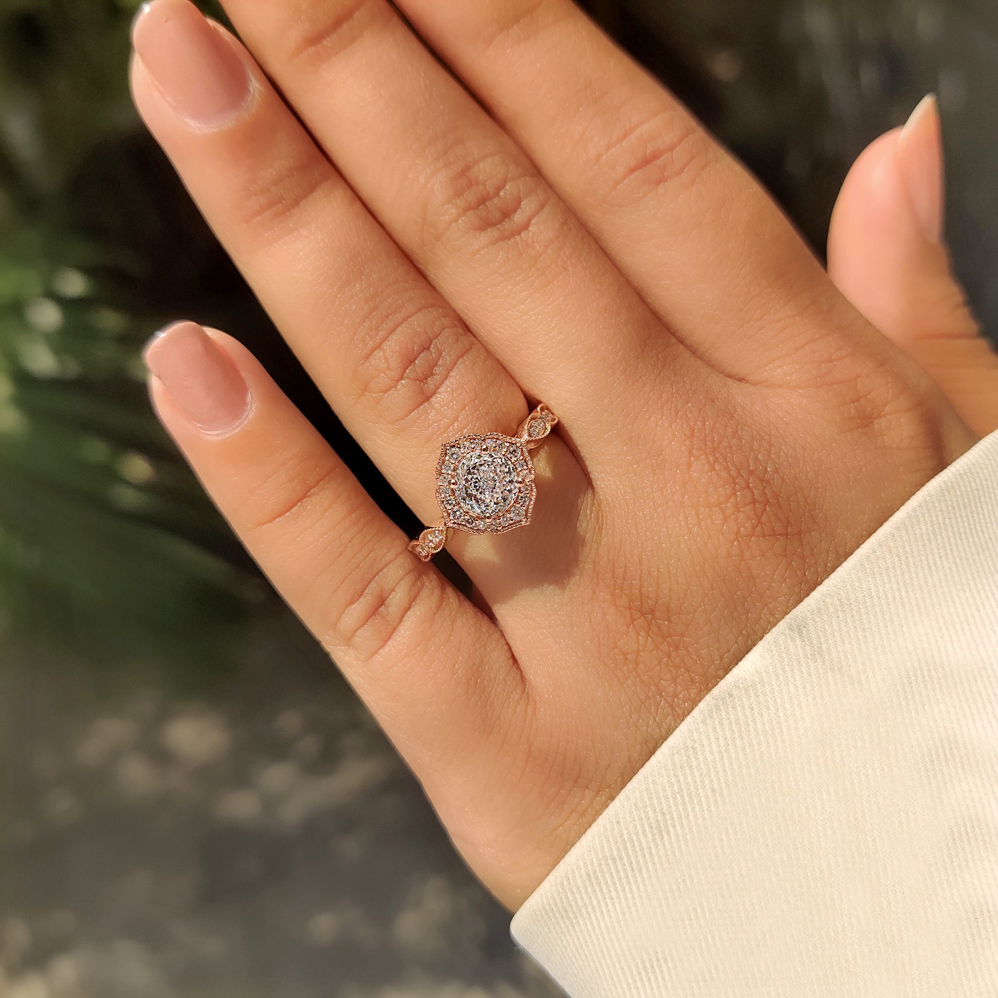 Portuguese cut diamond ring with milgrain and four prong setting.
