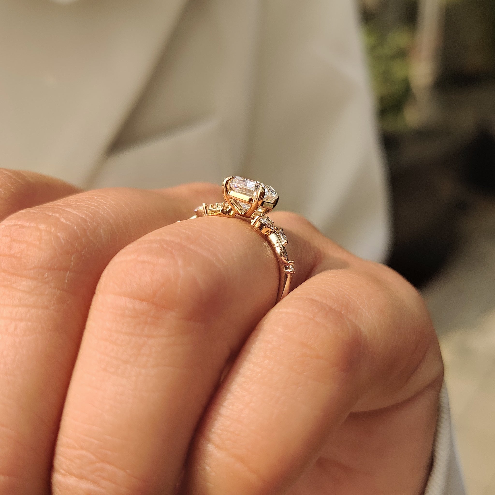 Lab grown diamond ring with old mine emerald cut center
