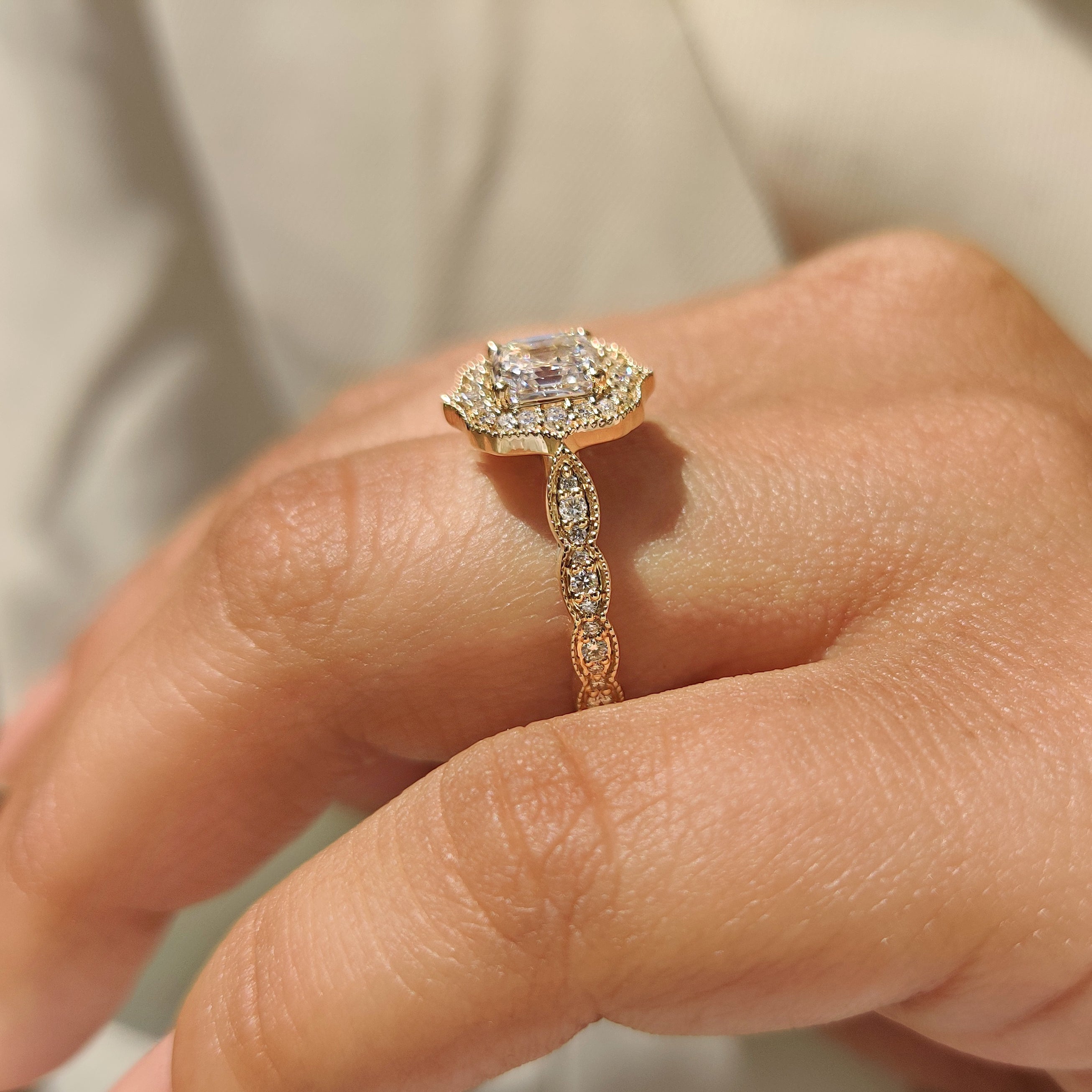 Asscher cut diamond ring with cathedral setting.
