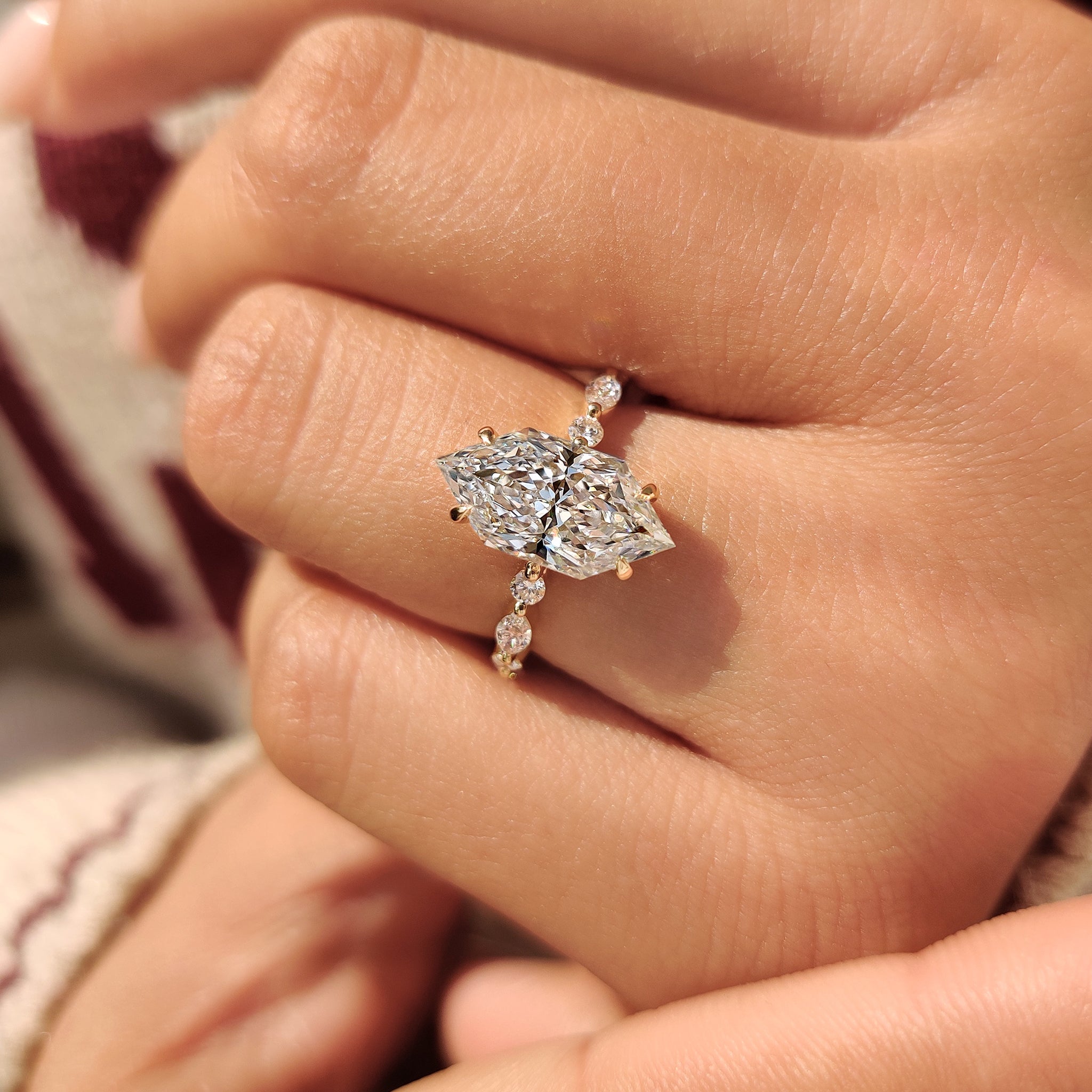 Dutch marquise engagement ring with open gallery setting.

