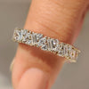 Full eternity band with round marquise and baguette diamonds.
