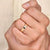Handmade men’s wedding band with round cut stones.
