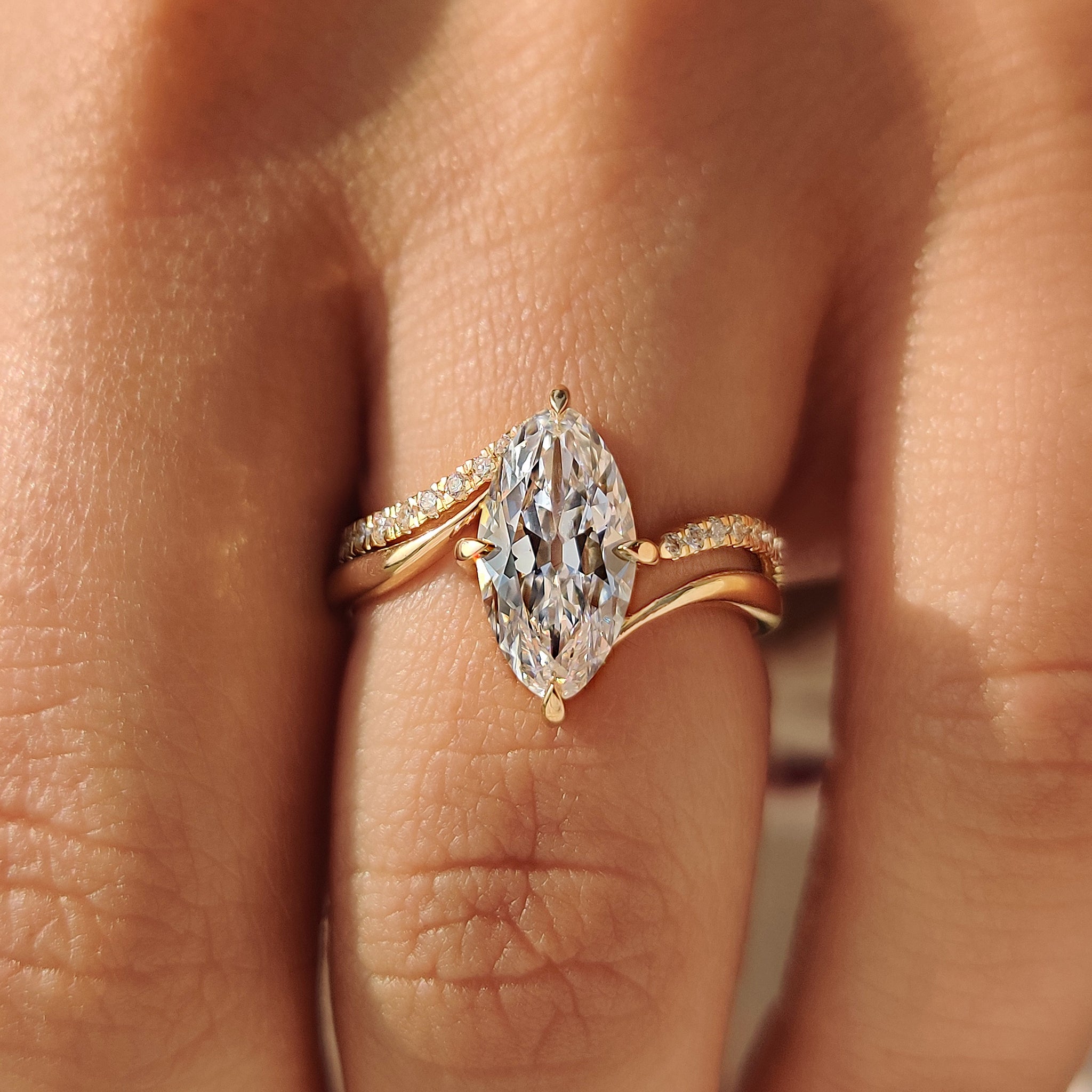 Marquise ring with wedding band using compass claw prong setting
