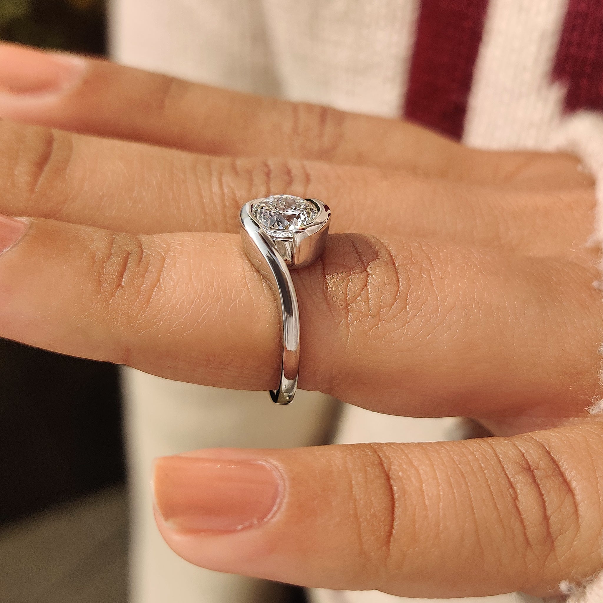 Lab grown Portuguese diamond ring with bypass setting.
