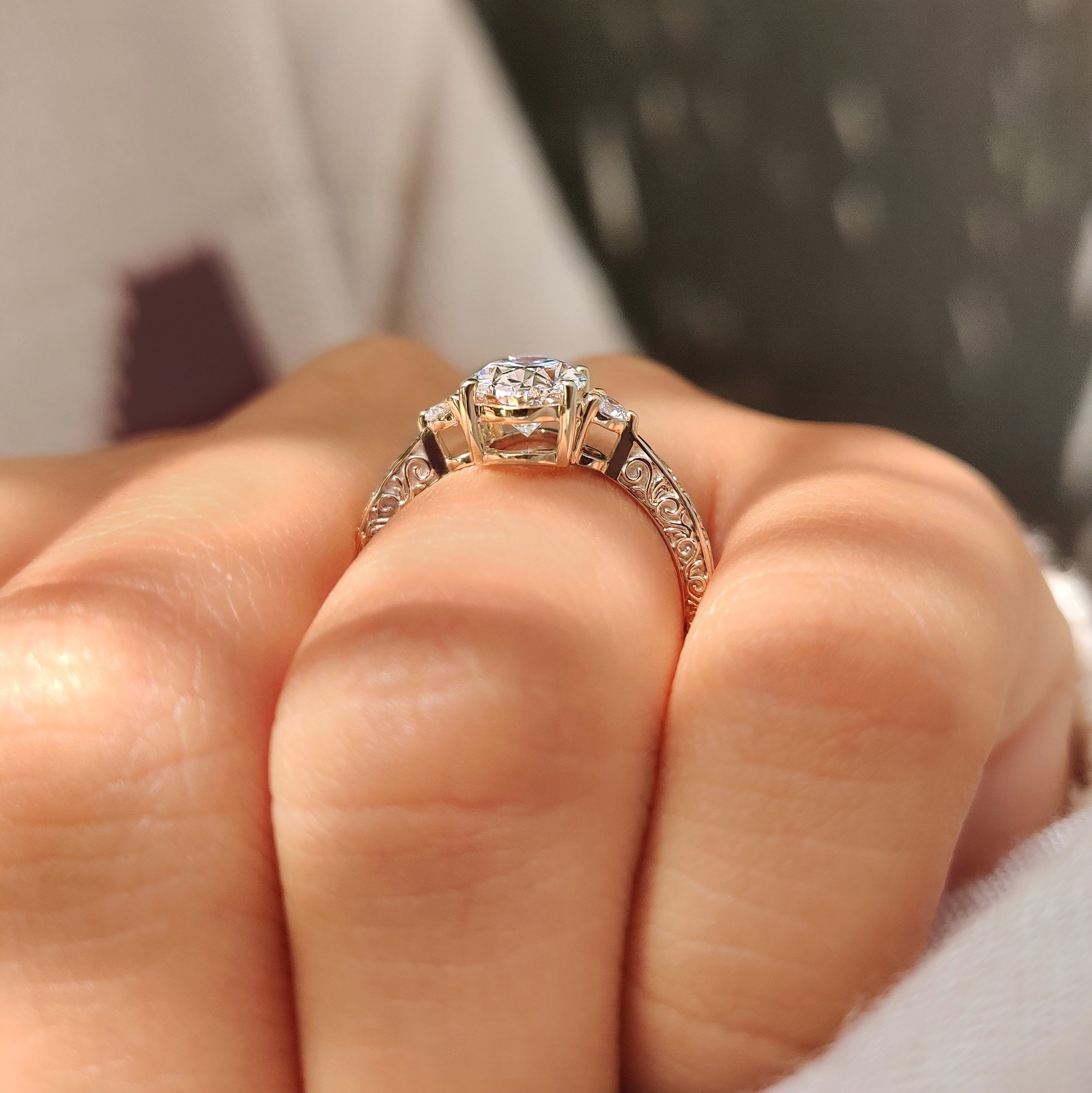 Vintage filigree ring with oval center and tapered band.
