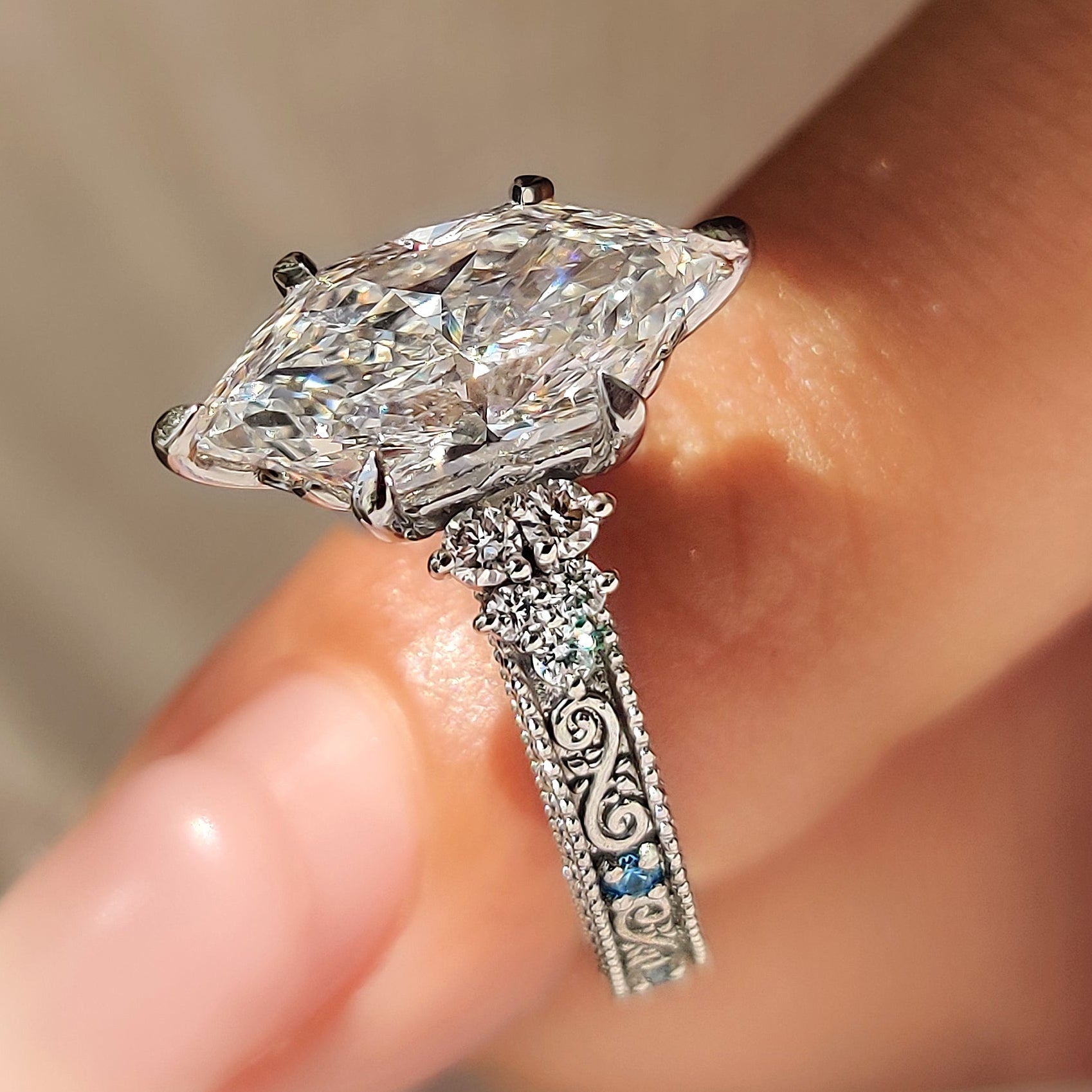 Milgrain detailing along the white gold ring band.
