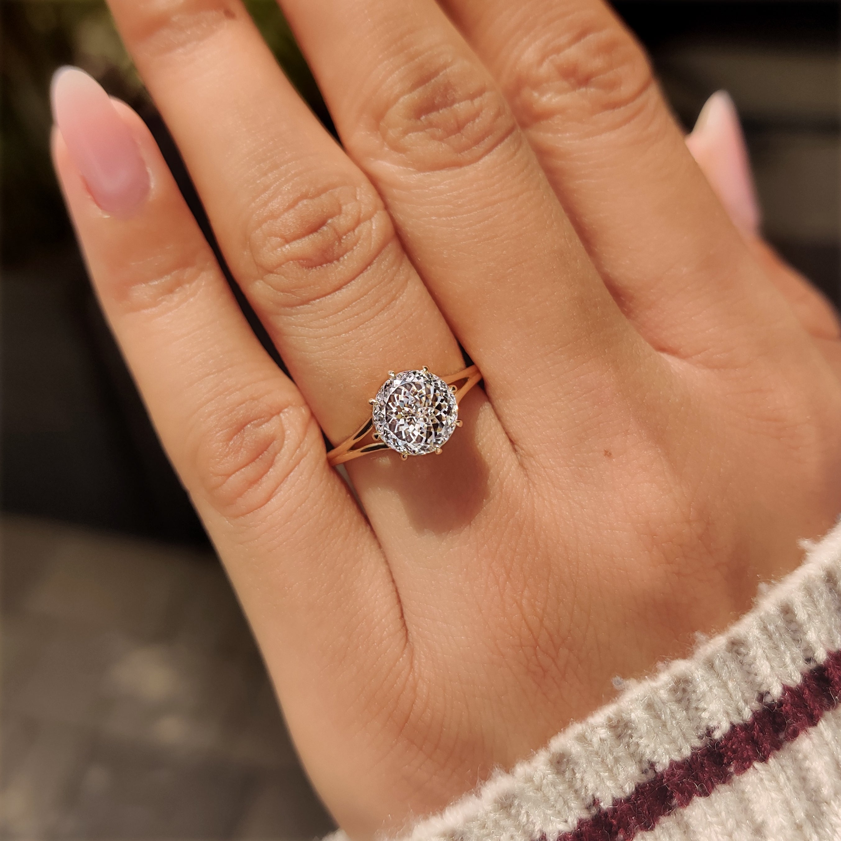 Basket setting Portuguese diamond solitaire ring.
