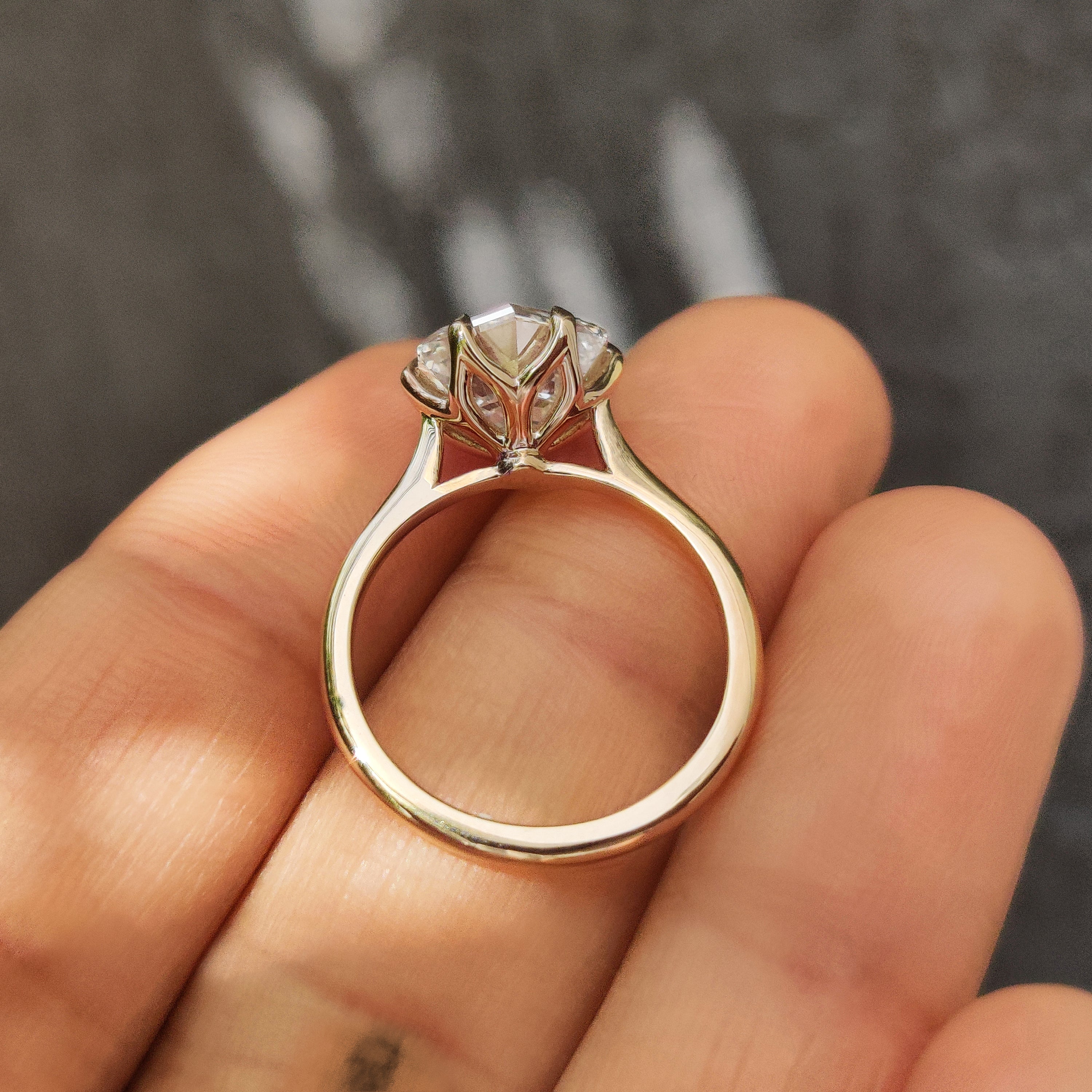 Handmade hexagon diamond ring with tulip style prong setting
