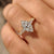 Marquise diamond ring with milgrain details and cathedral setting.
