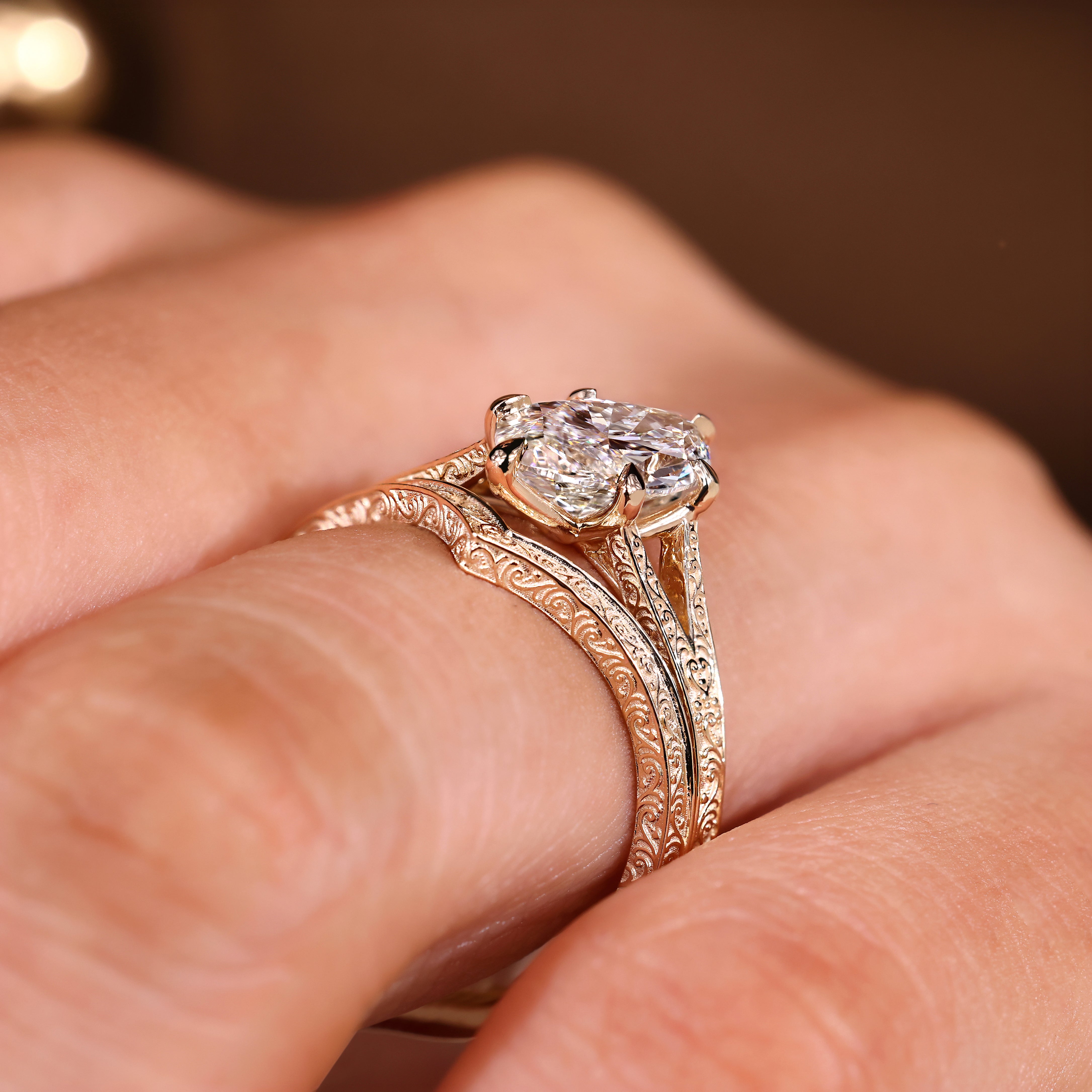 Handmade marquise bridal ring set with a vintage-inspired curved wedding band
