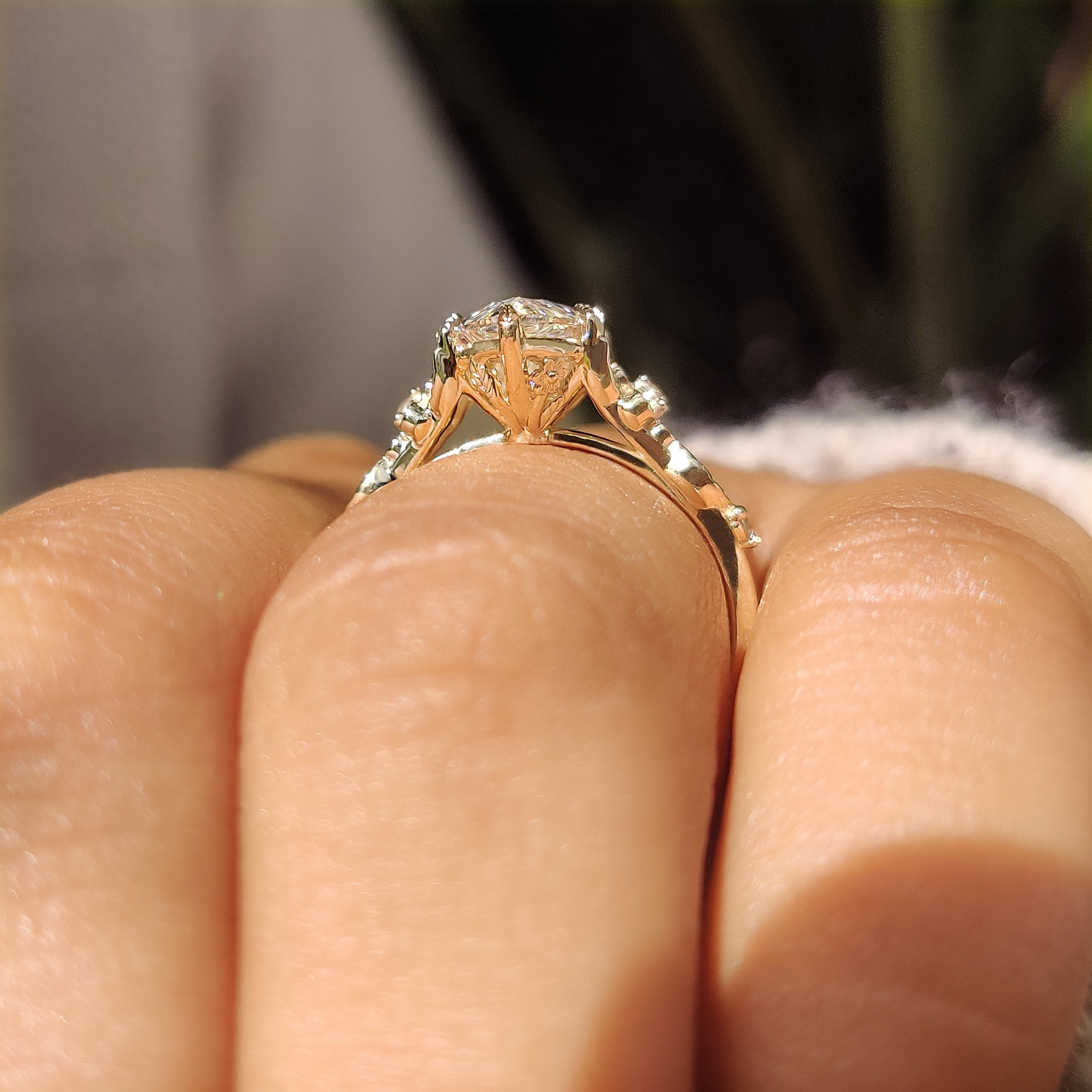 Handmade marquise diamond ring with six leaf style prongs
