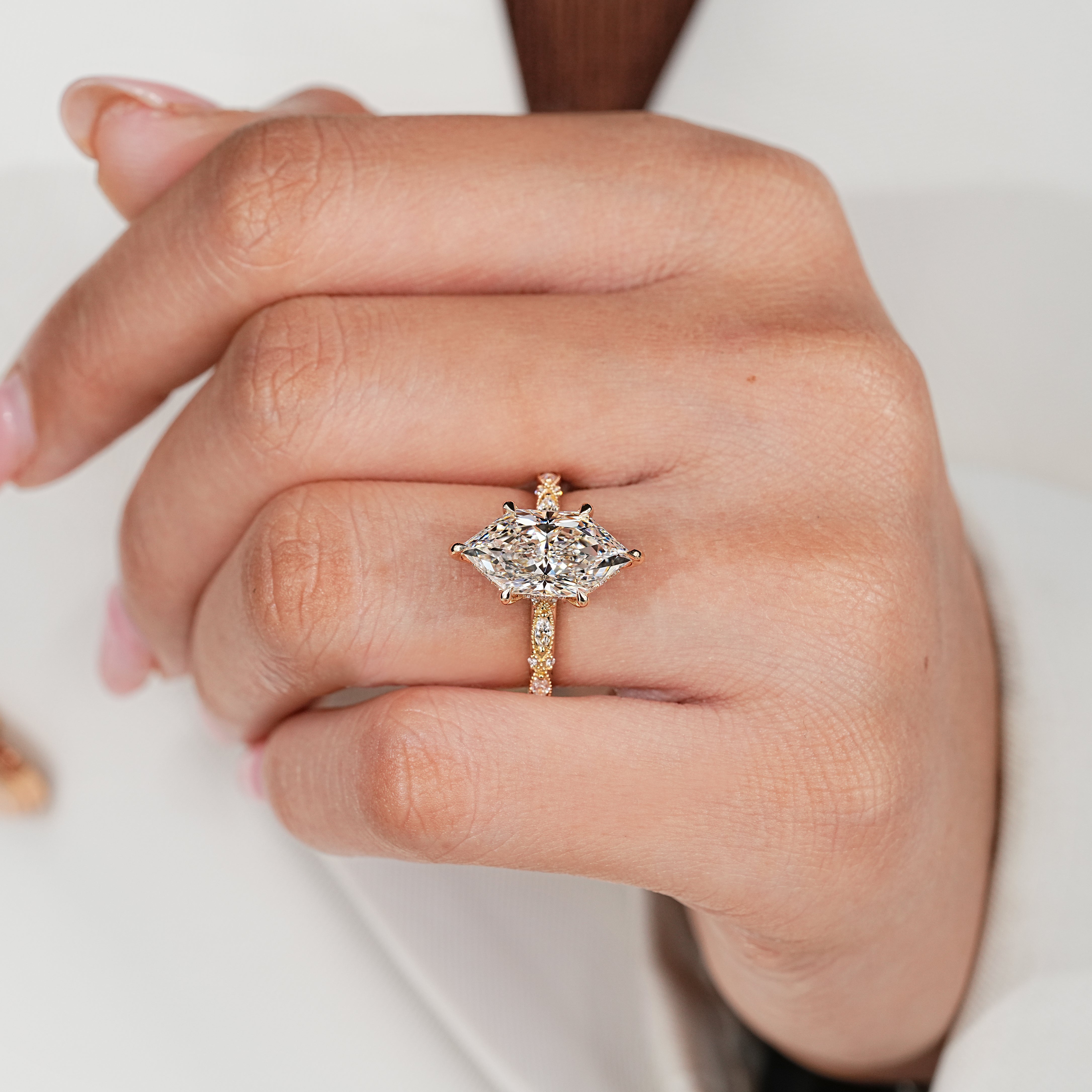 Vintage inspired engagement ring with marquise and round pave
