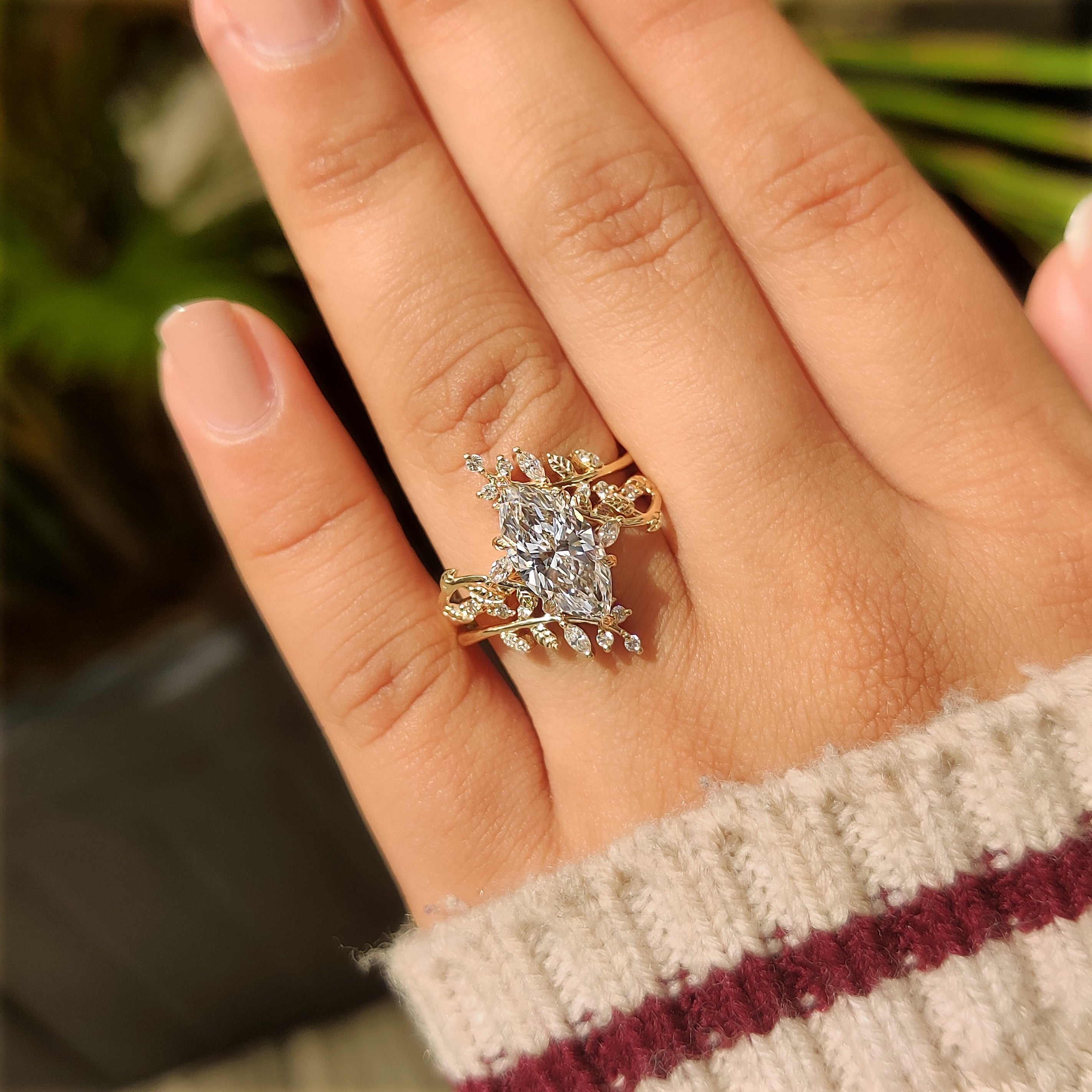 Marquise and round diamond ring with wrap guard band
